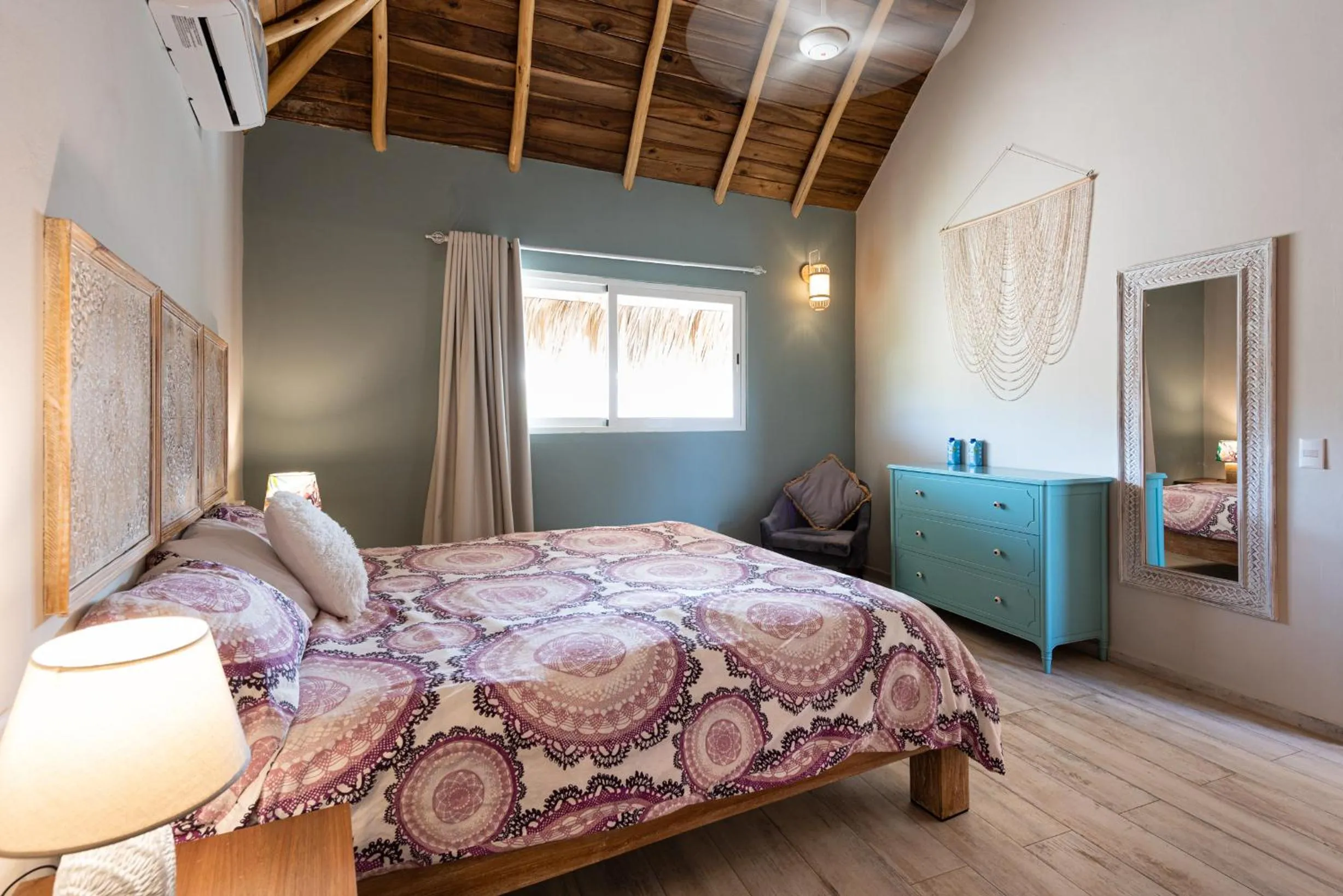 Bed in TAKUMA BOUTIK HOTEL