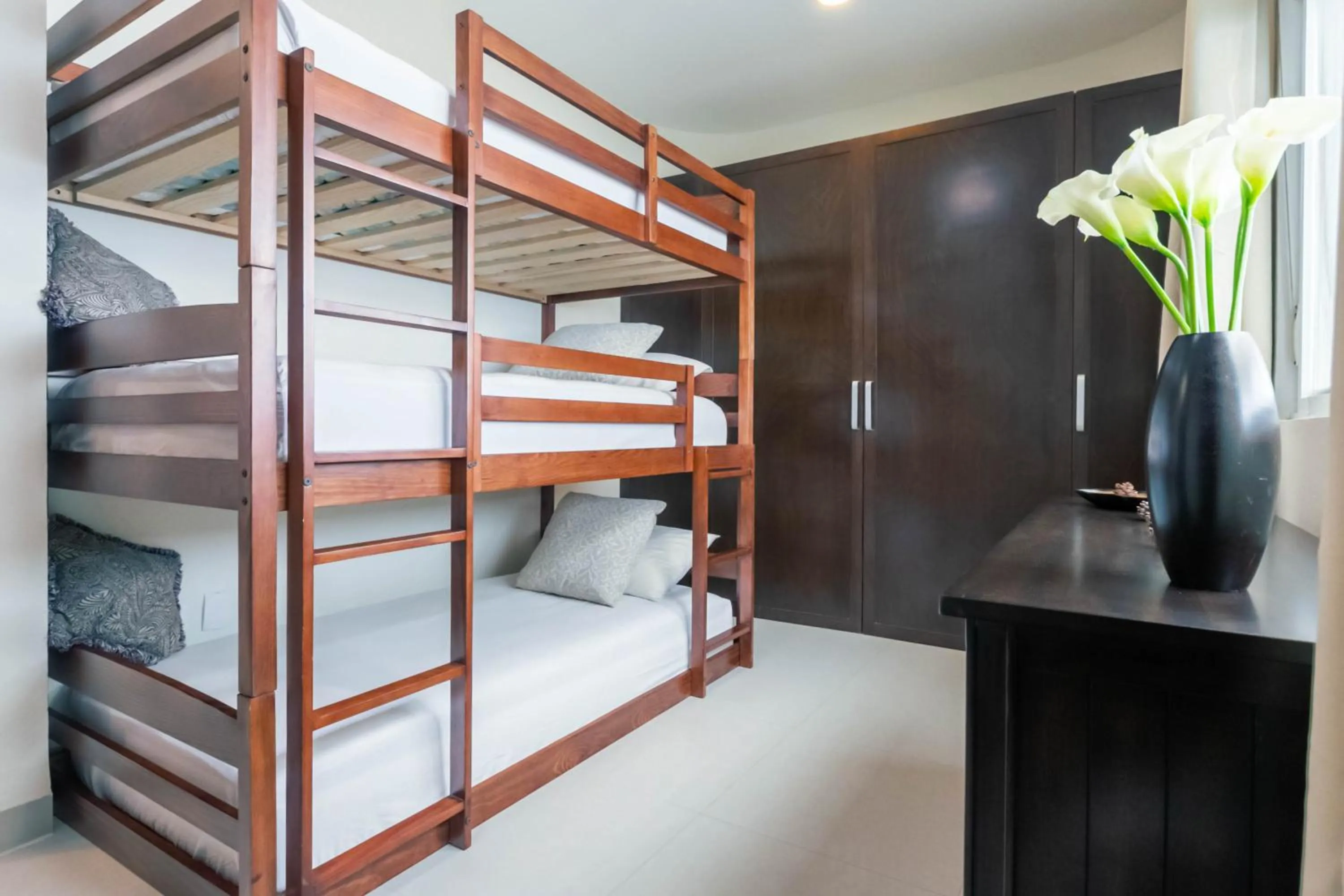 Bed in Sunset Condo 104 Puerta al Mar Isla Mujeres Mexico