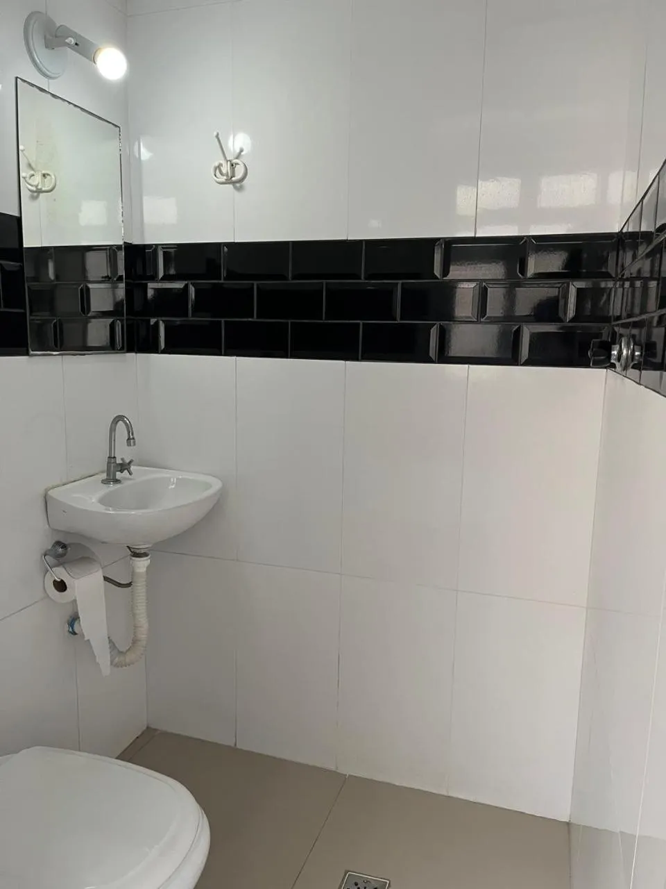 Bathroom in APARTAMENTO 74 Guarujá Pitangueiras Pé na Areia Vista para o Mar 7º Andar