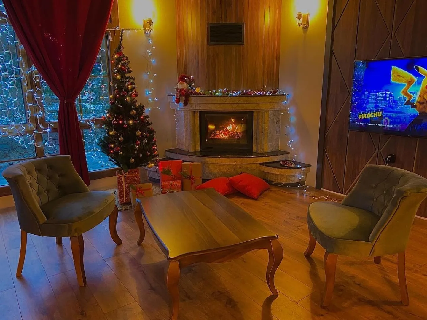 Communal lounge/ TV room in River Didi Otel