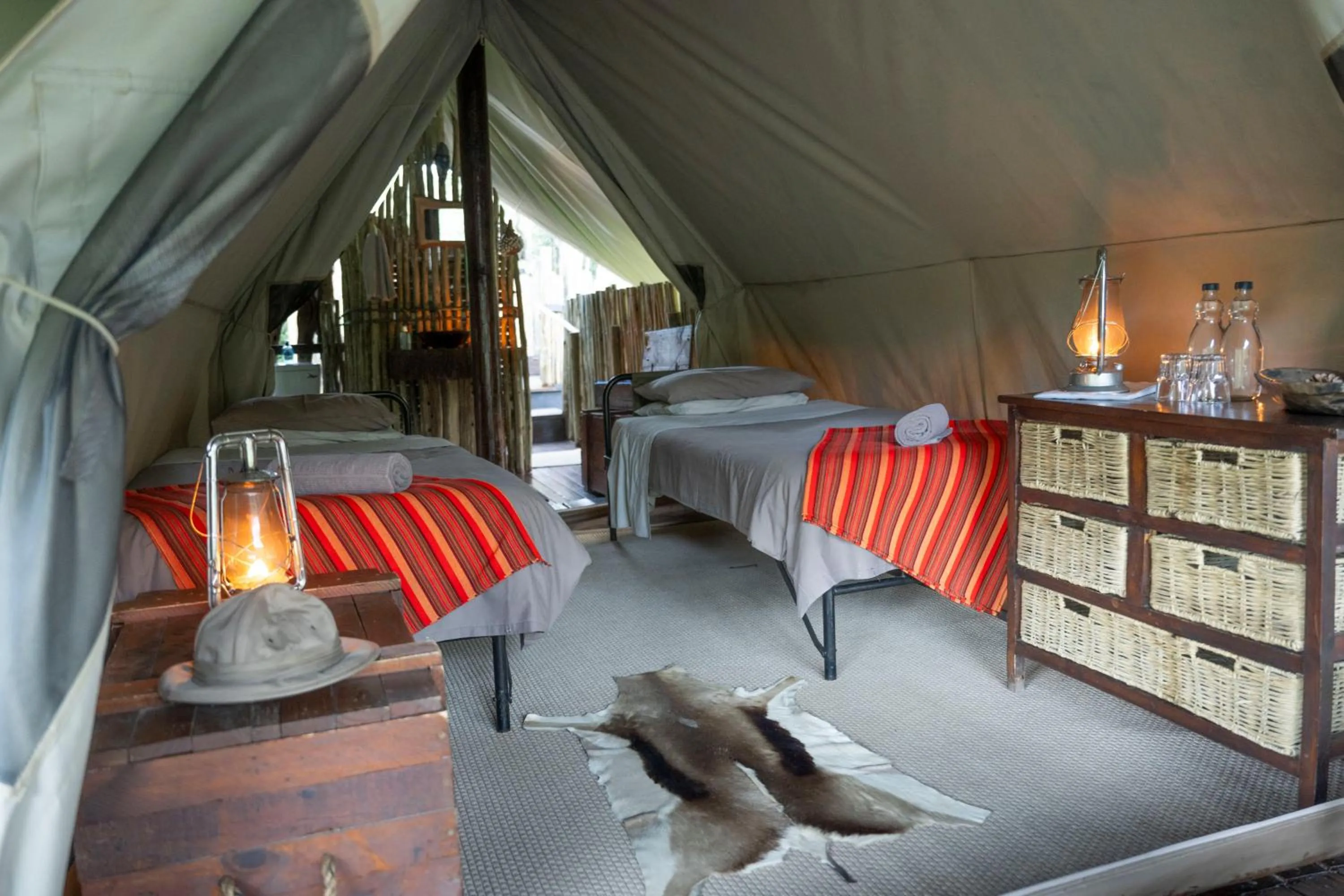 Bedroom, Bed in Quatermain's 1920's Safari Camp – Amakhala Game Reserve
