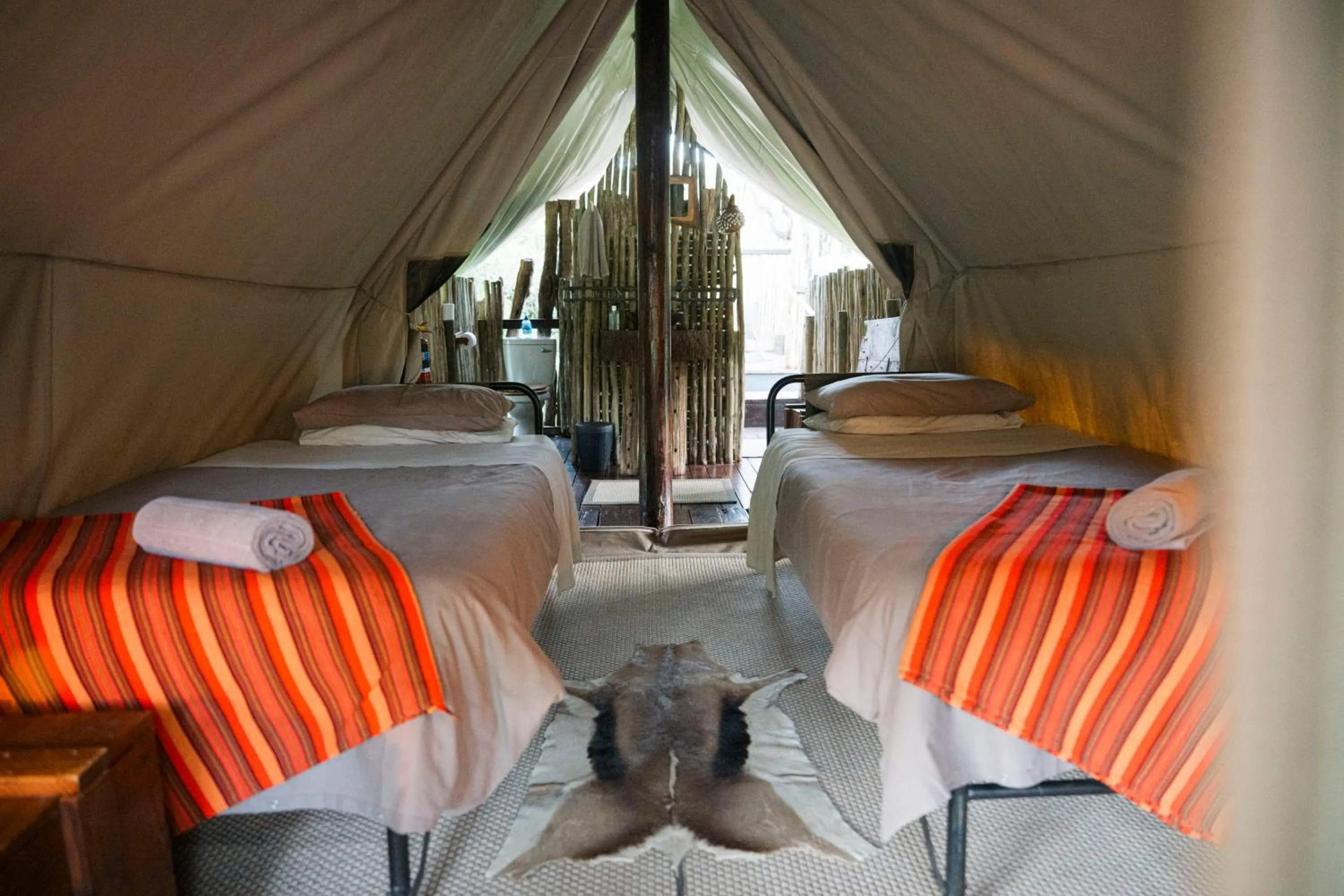 Bedroom, Bed in Quatermain's 1920's Safari Camp – Amakhala Game Reserve