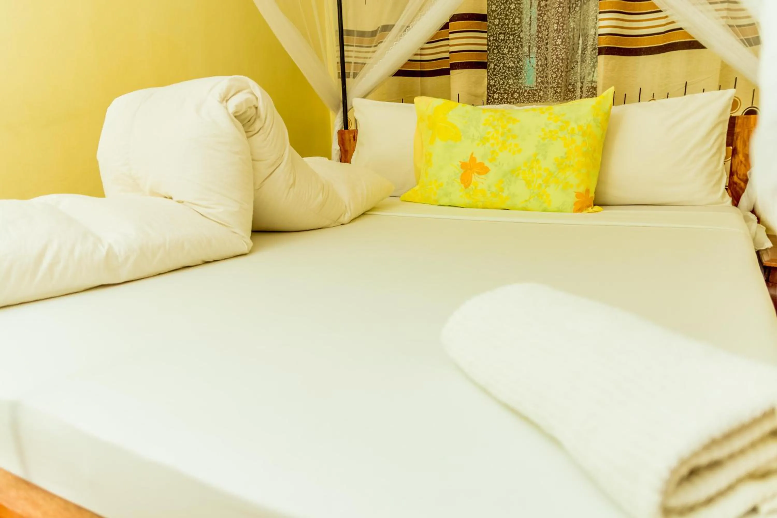 Bed in Kilimanjaro Summit Lodge