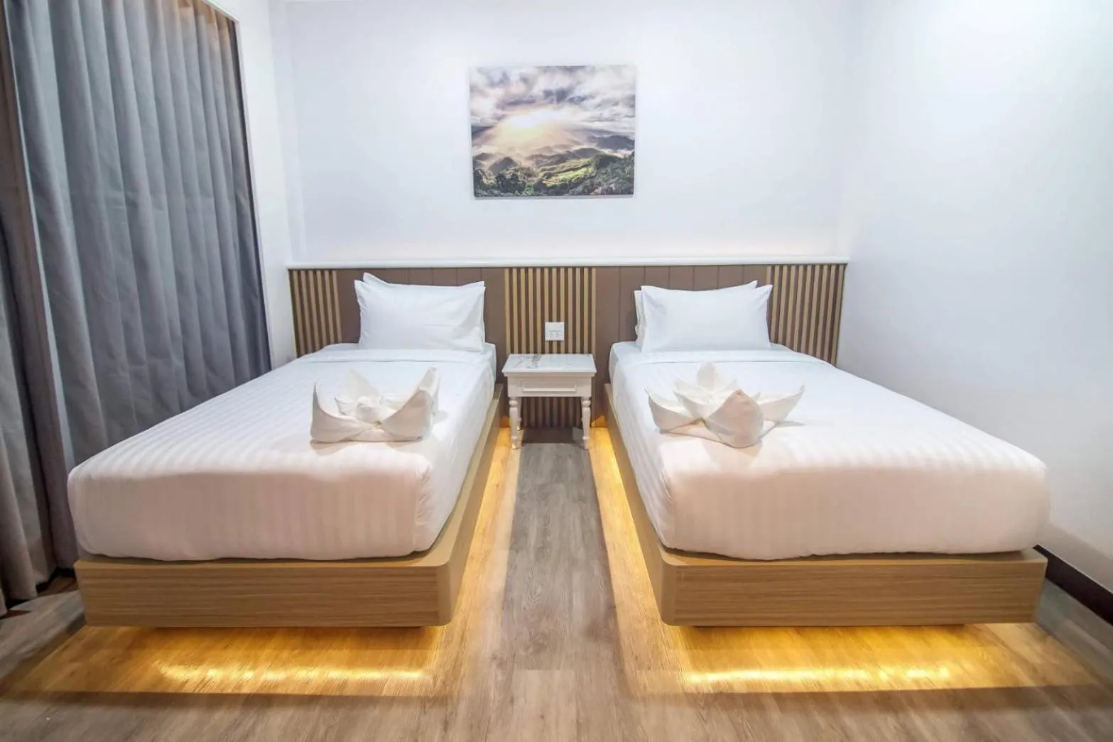 Bed in Grandview Landmark Betong Hotel