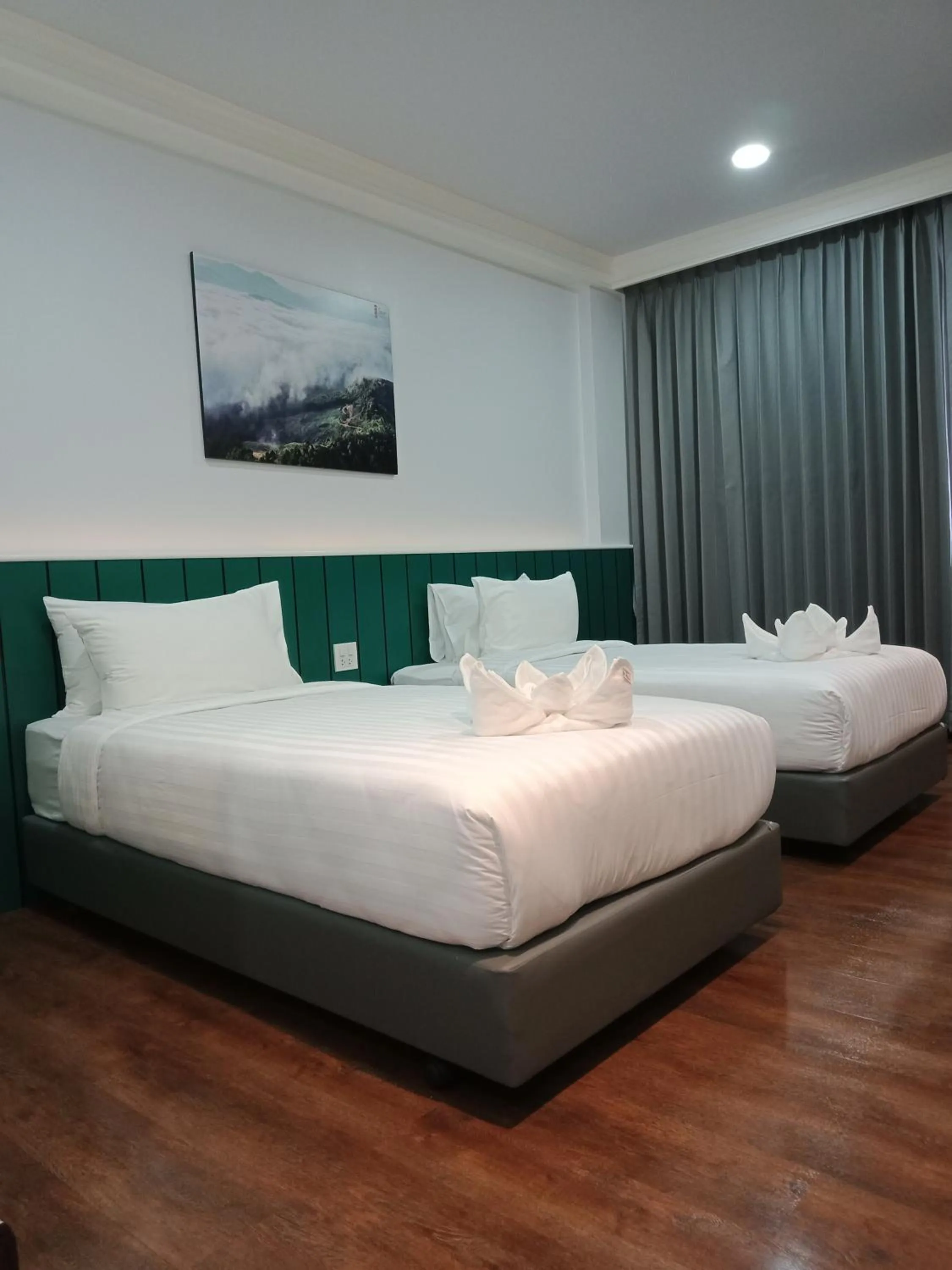 Bed in Grandview Landmark Betong Hotel