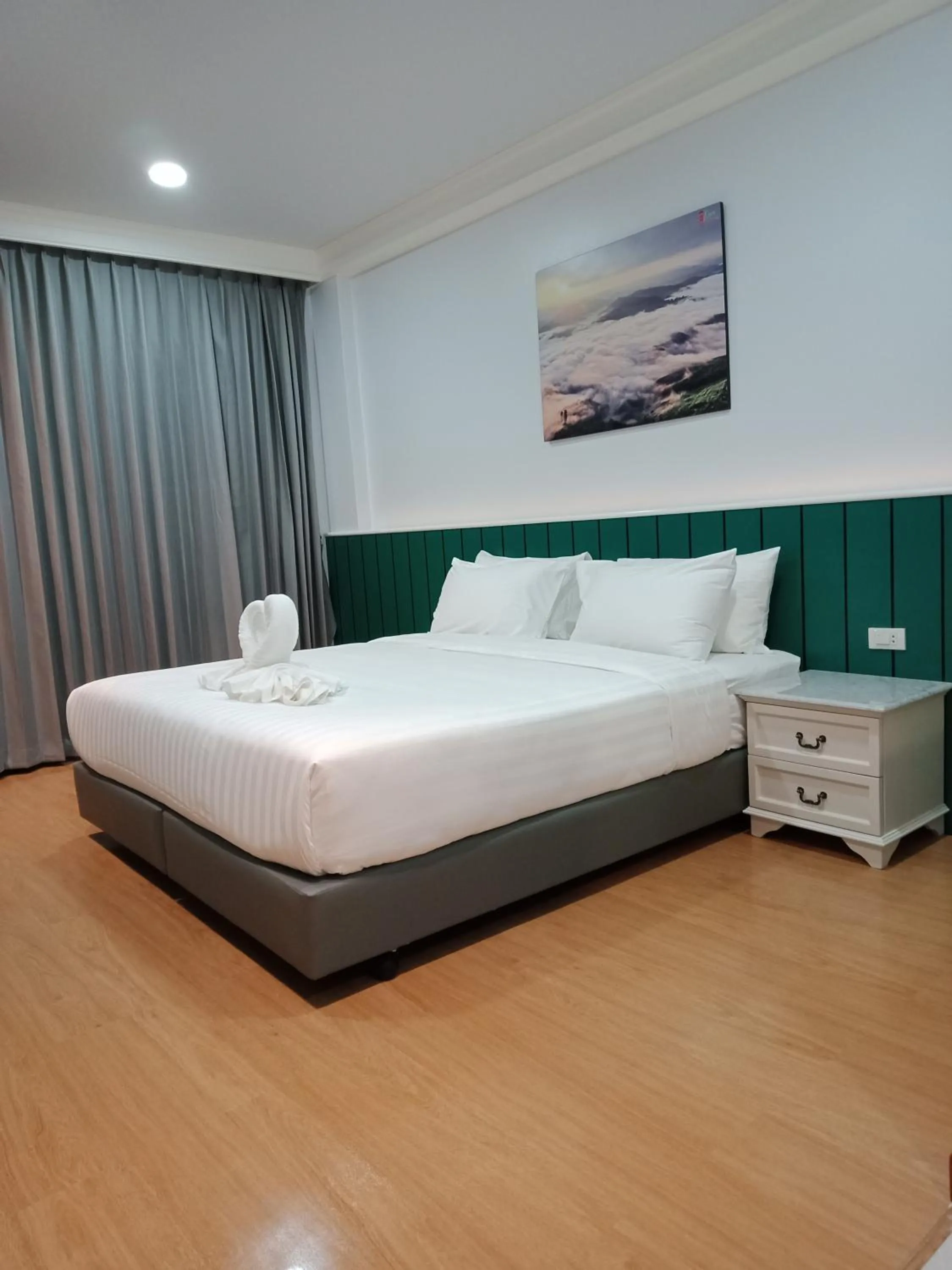 Bed in Grandview Landmark Betong Hotel