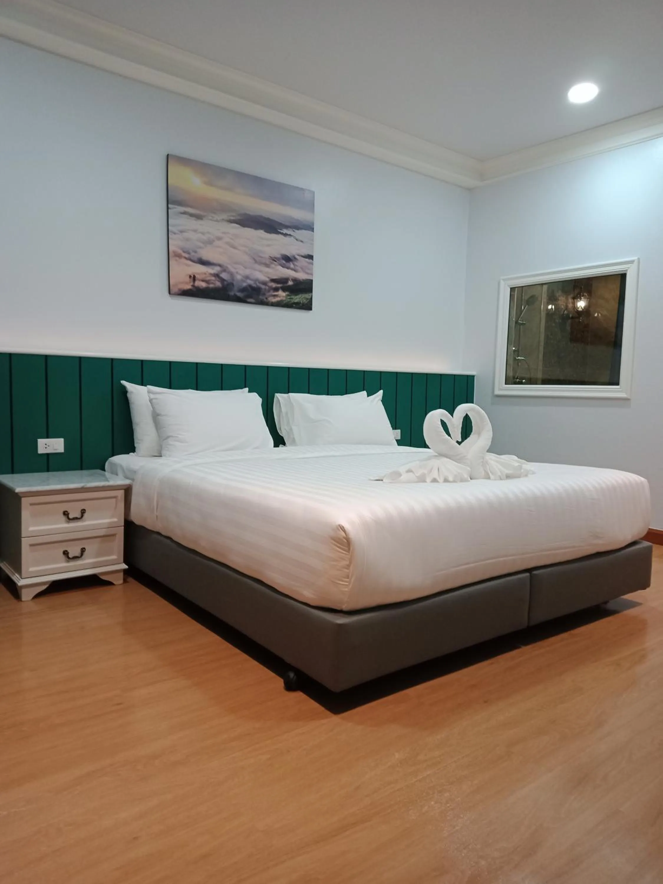 Bed in Grandview Landmark Betong Hotel