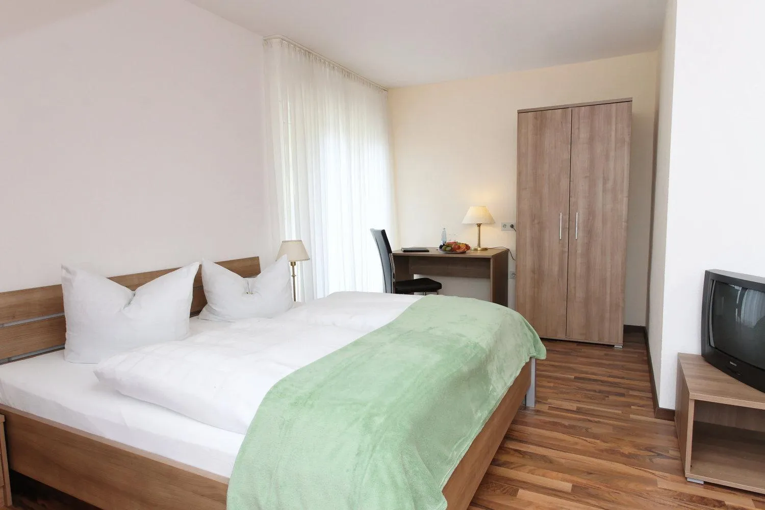 Photo of the whole room, Bed in Luckai Hotel & Restaurant Inhaber Dennis Burmann