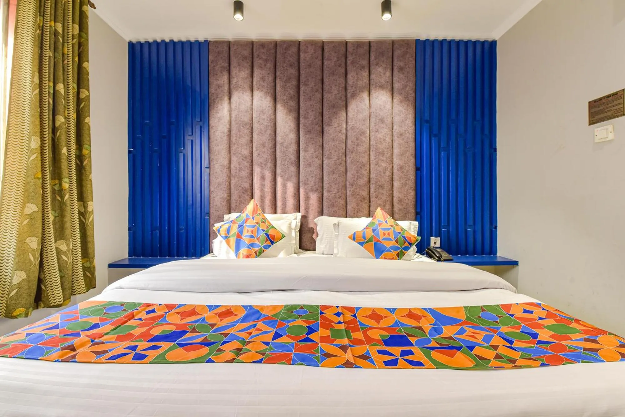 Bed in FabHotel Prem Bihari