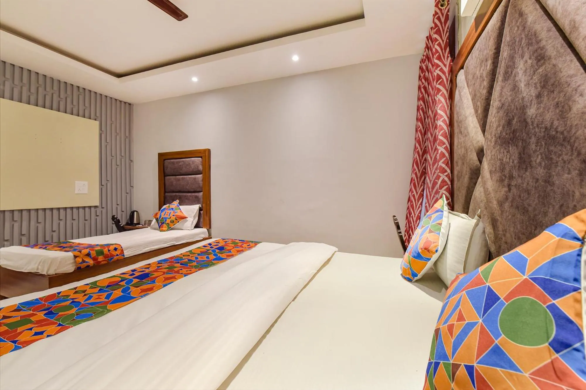 Bed in FabHotel Prem Bihari