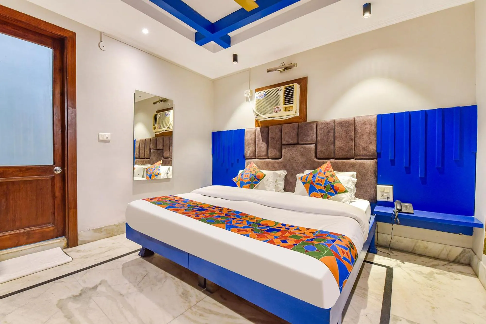 Bed in FabHotel Prem Bihari