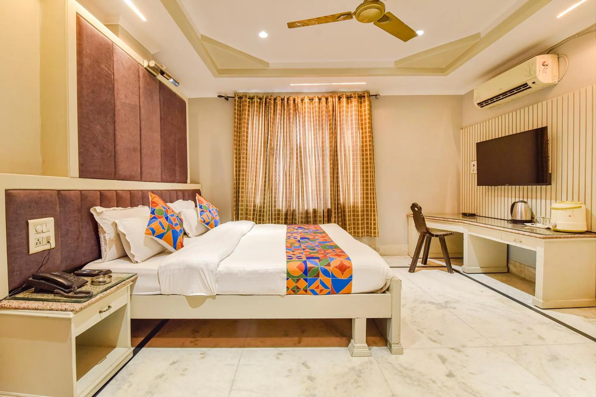 Bed in FabHotel Prem Bihari