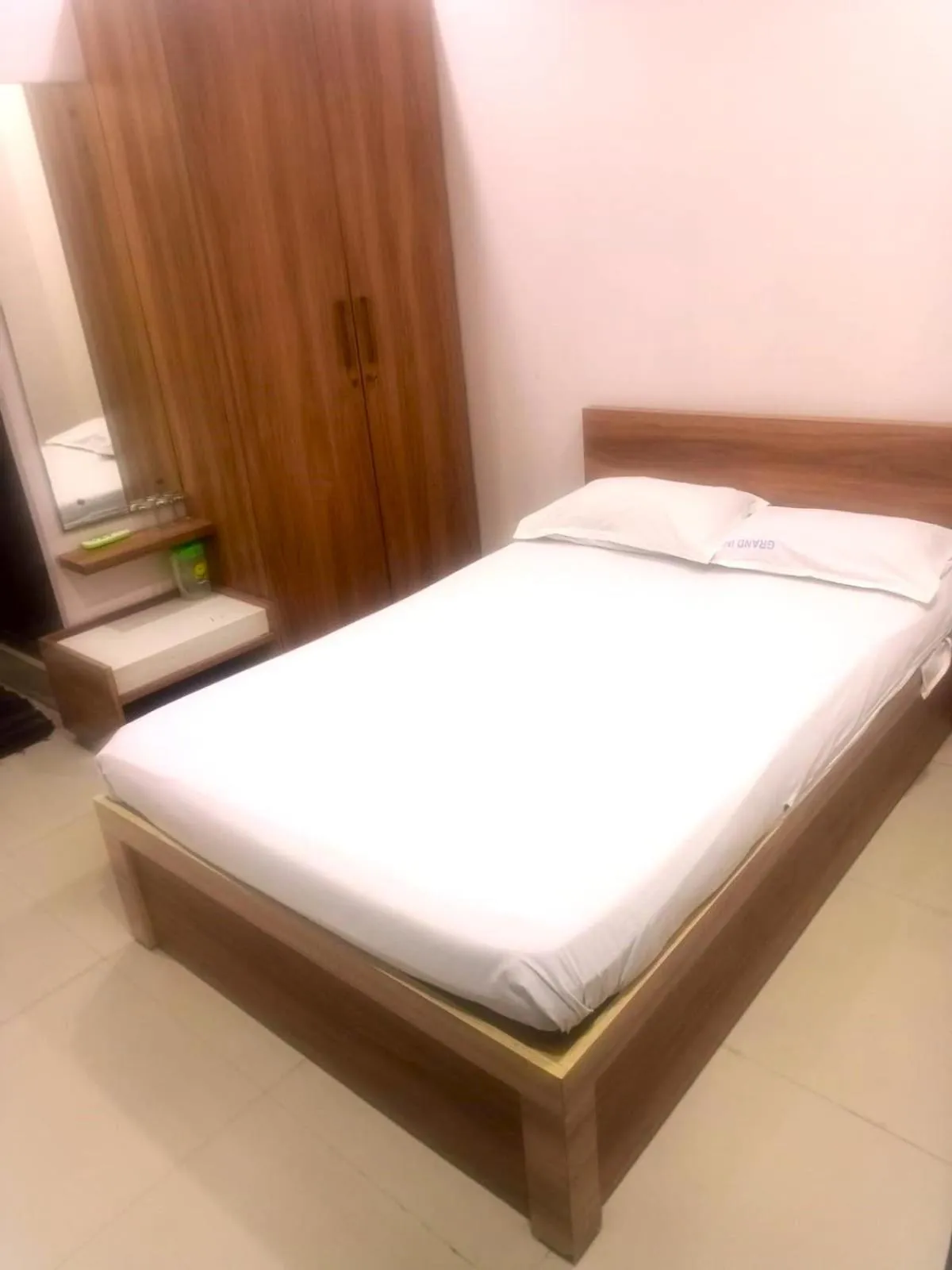 Bed in The Grand Inn