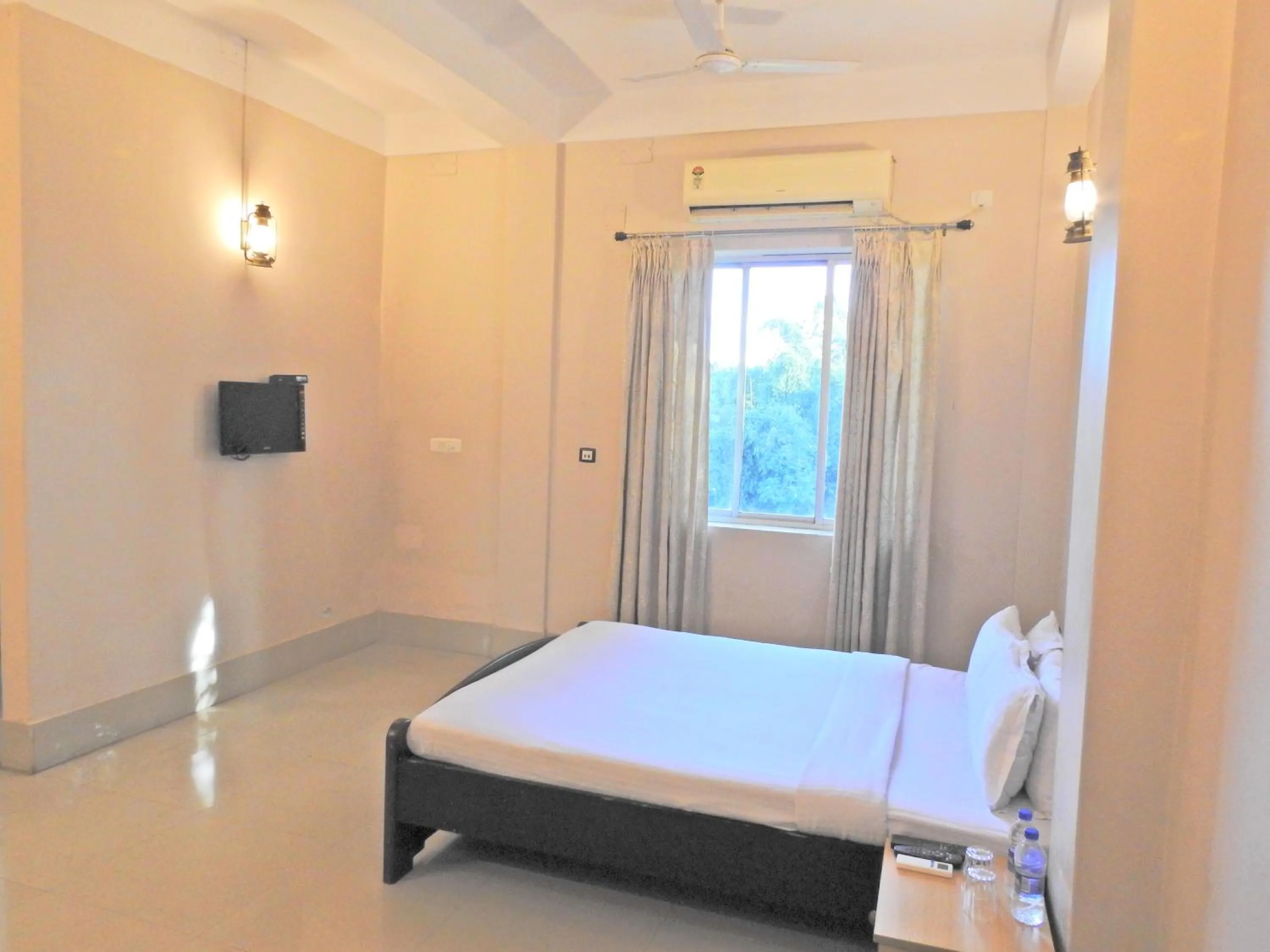 Bed in Lake Side Resort Neermahal