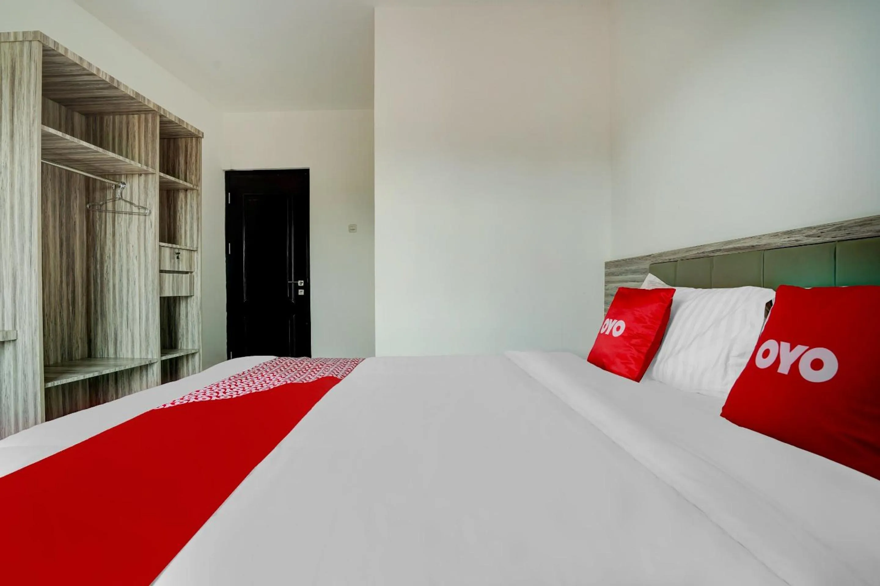 Bedroom in OYO Capital O 90164 La'rissa Residence