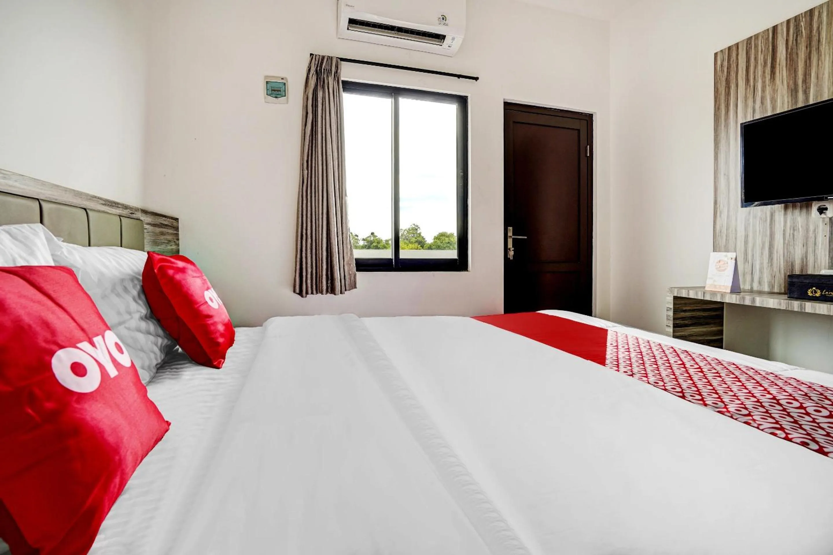 Bedroom in OYO Capital O 90164 La'rissa Residence