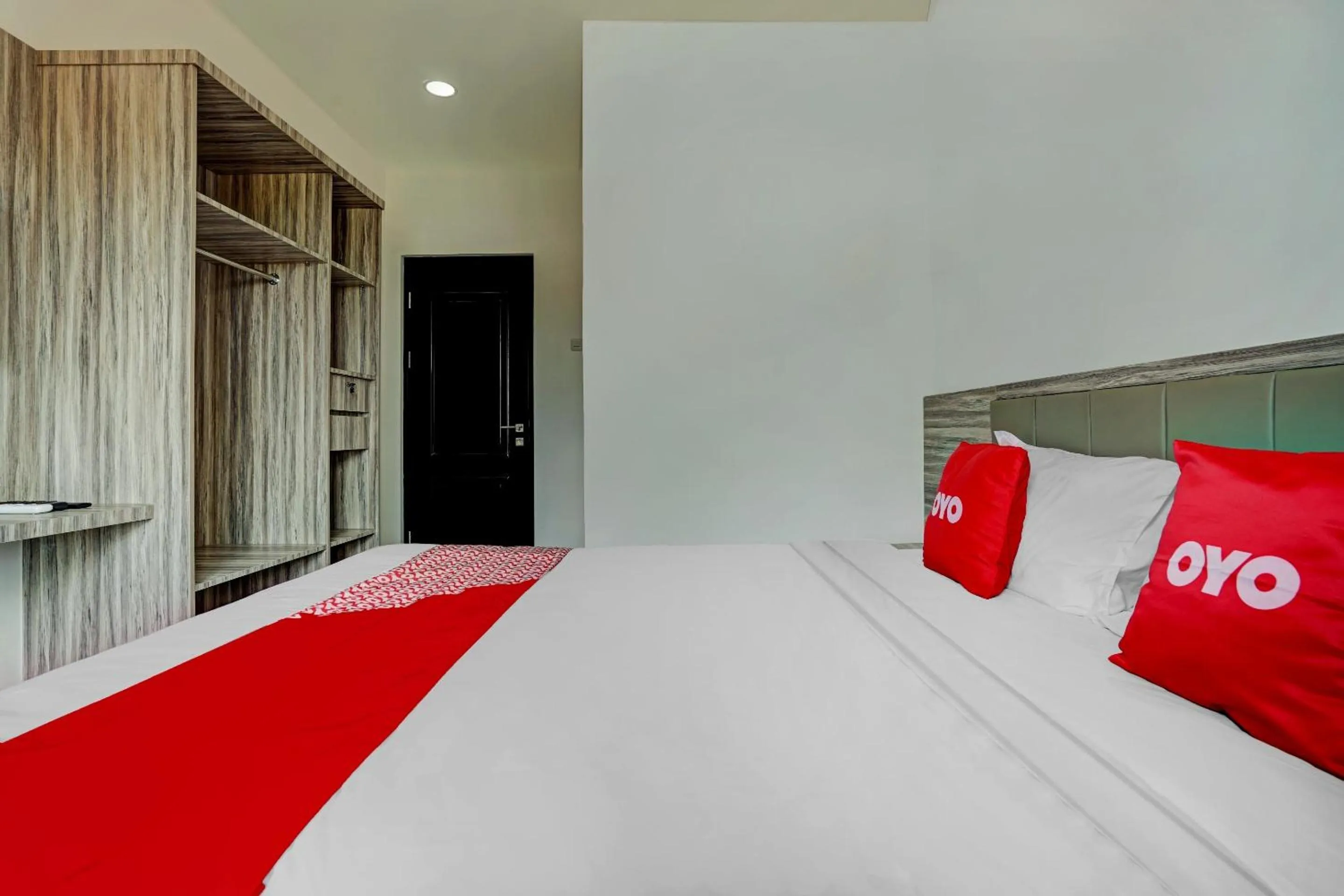 Bedroom in OYO Capital O 90164 La'rissa Residence