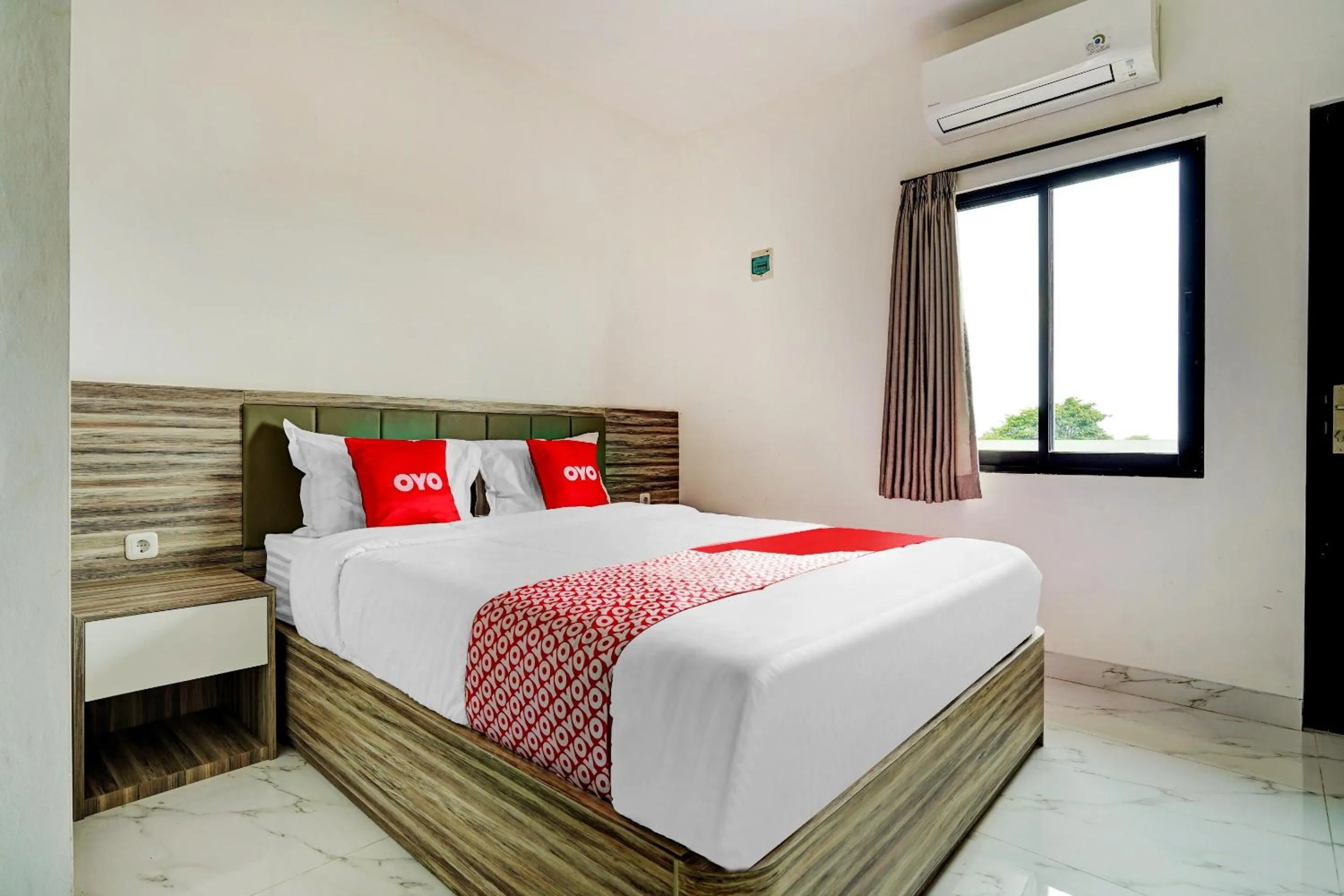 Bedroom in OYO Capital O 90164 La'rissa Residence