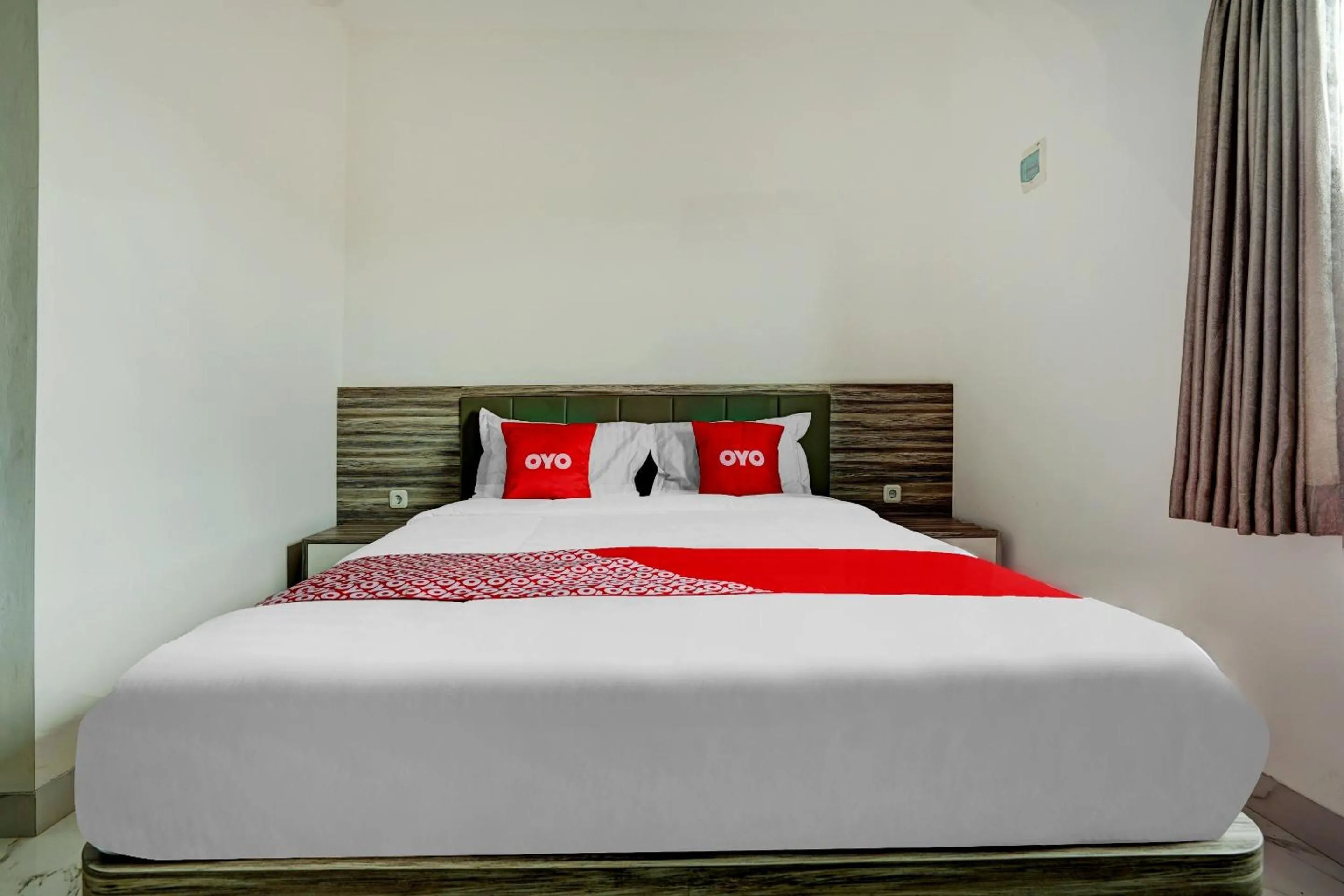 Bedroom in OYO Capital O 90164 La'rissa Residence