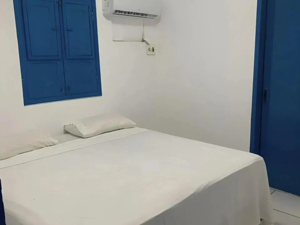 Bed in Pousada Jirituba