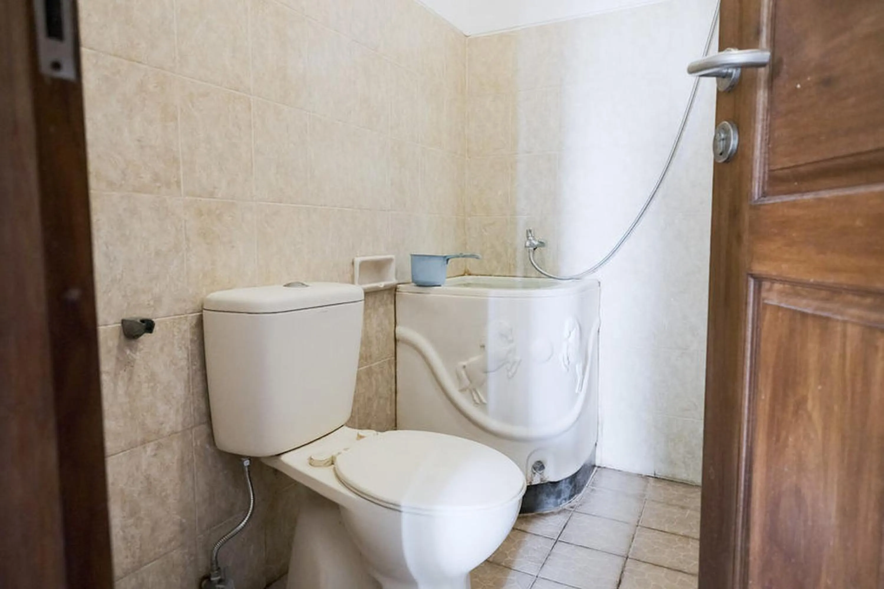 Toilet in Rumah Pahoman Syariah Mitra RedDoorz