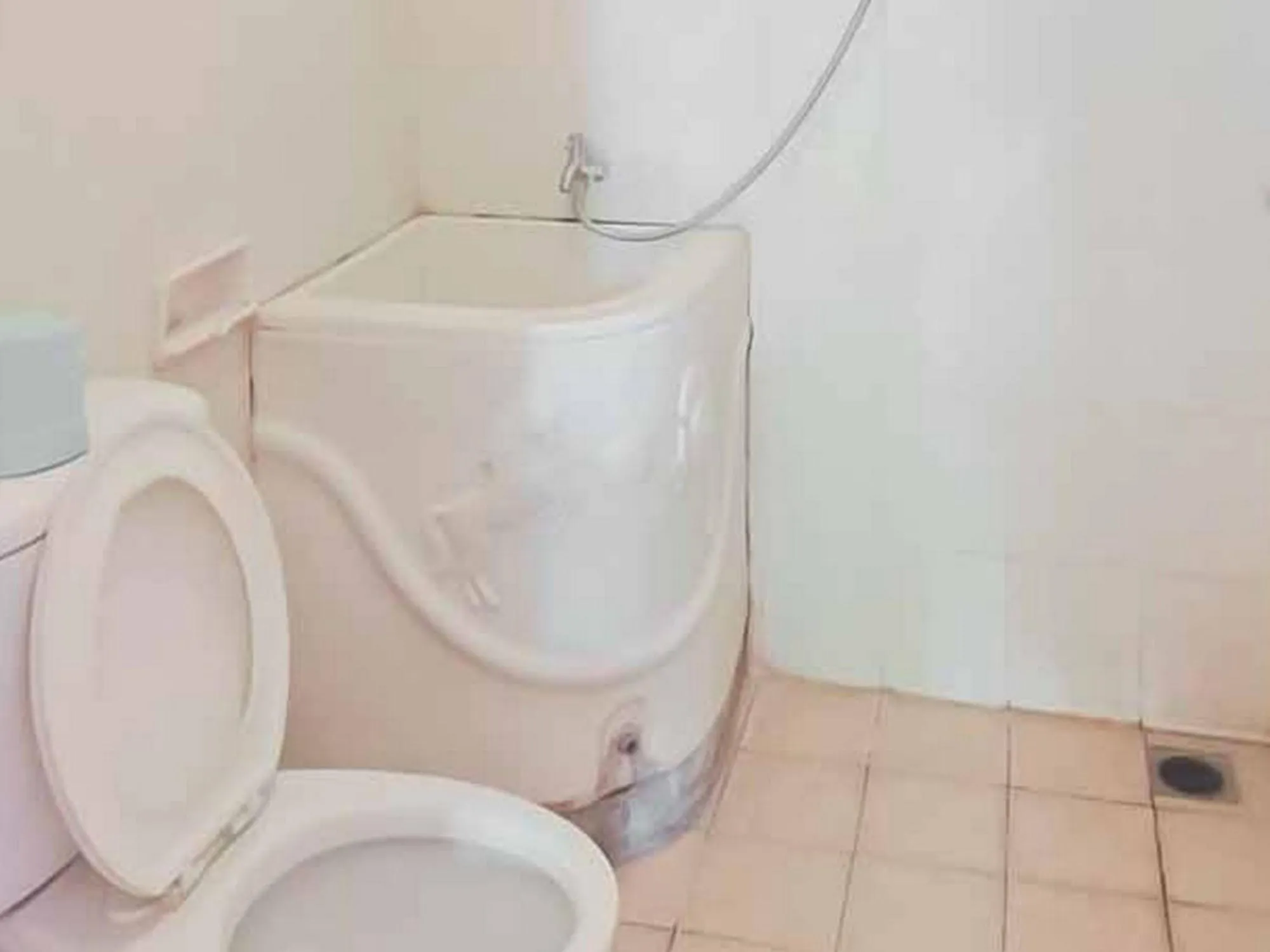 Toilet in Rumah Pahoman Syariah Mitra RedDoorz