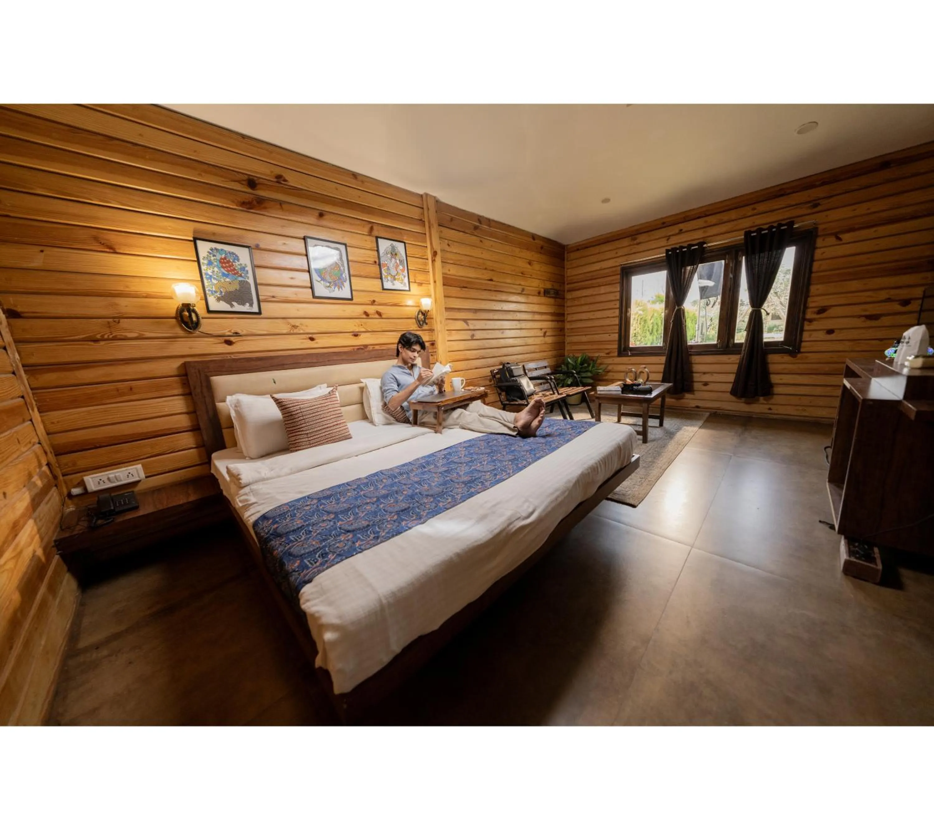 Bed in Panarpani Retreat Pachmarhi