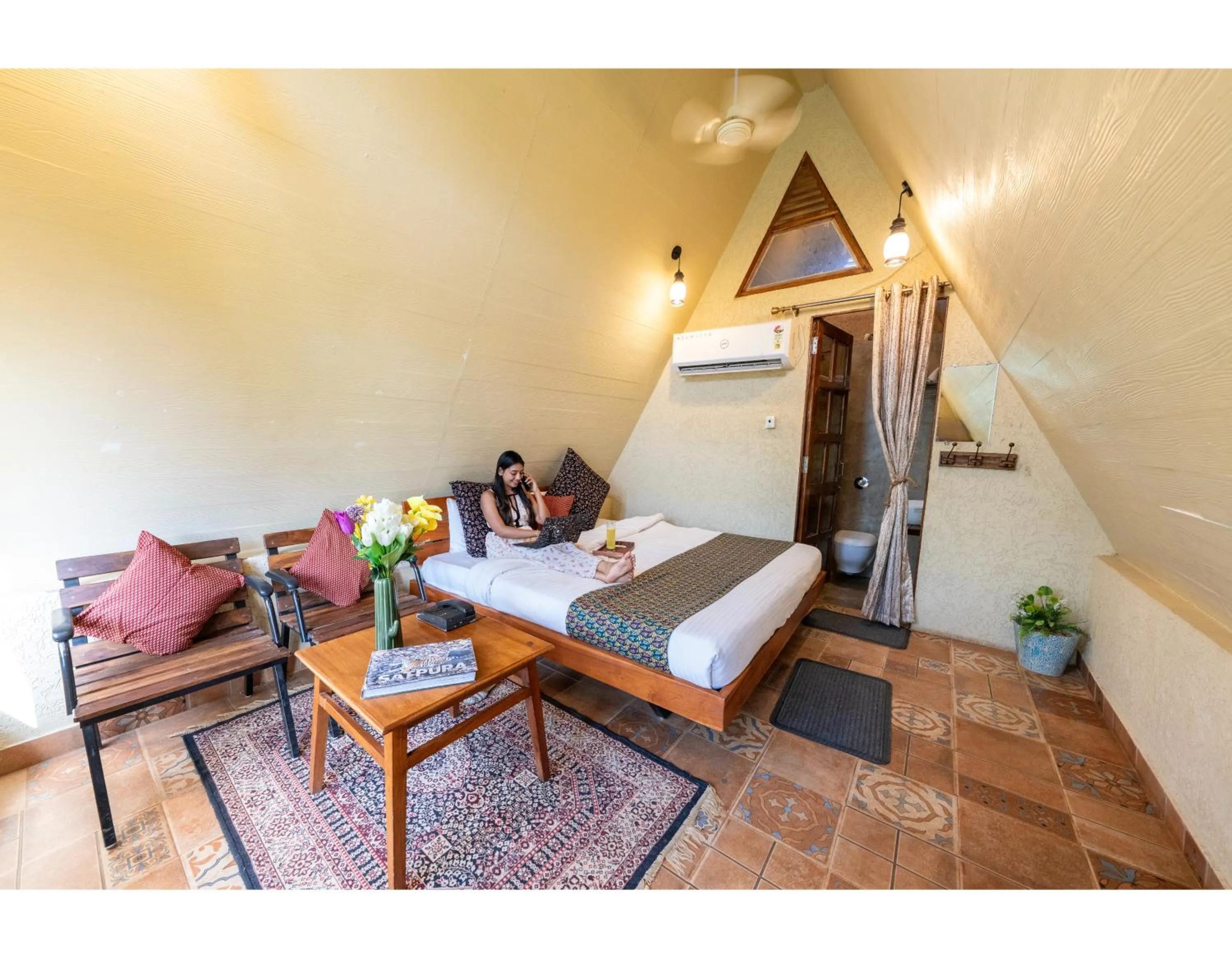 Bed in Panarpani Retreat Pachmarhi