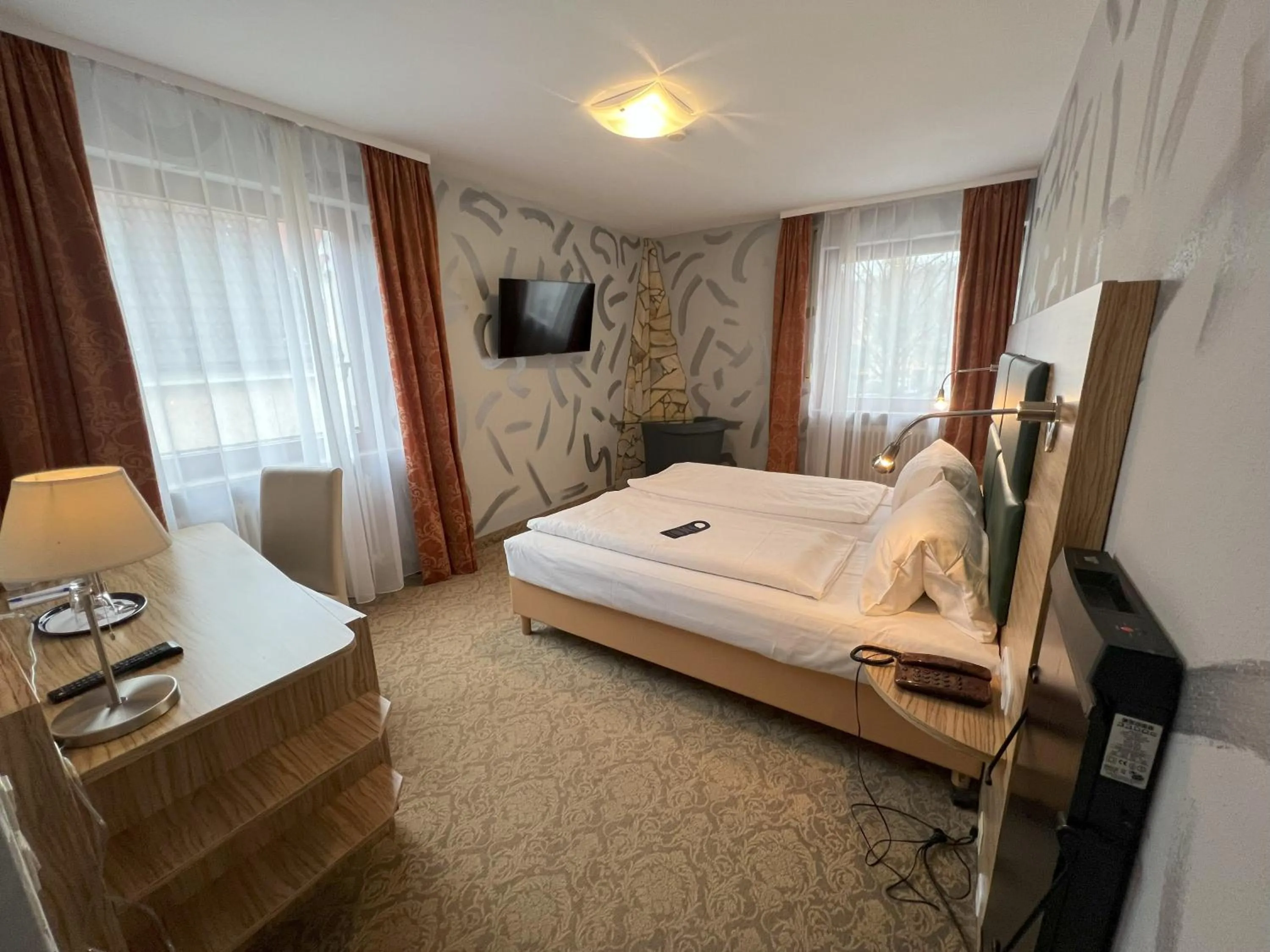 Photo of the whole room, Bed in Aparthotel Deutschmeister