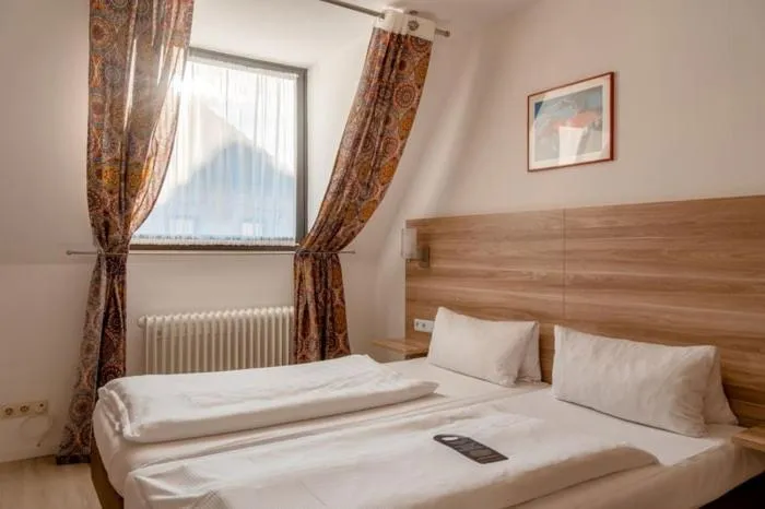 Bedroom, Bed in Aparthotel Deutschmeister