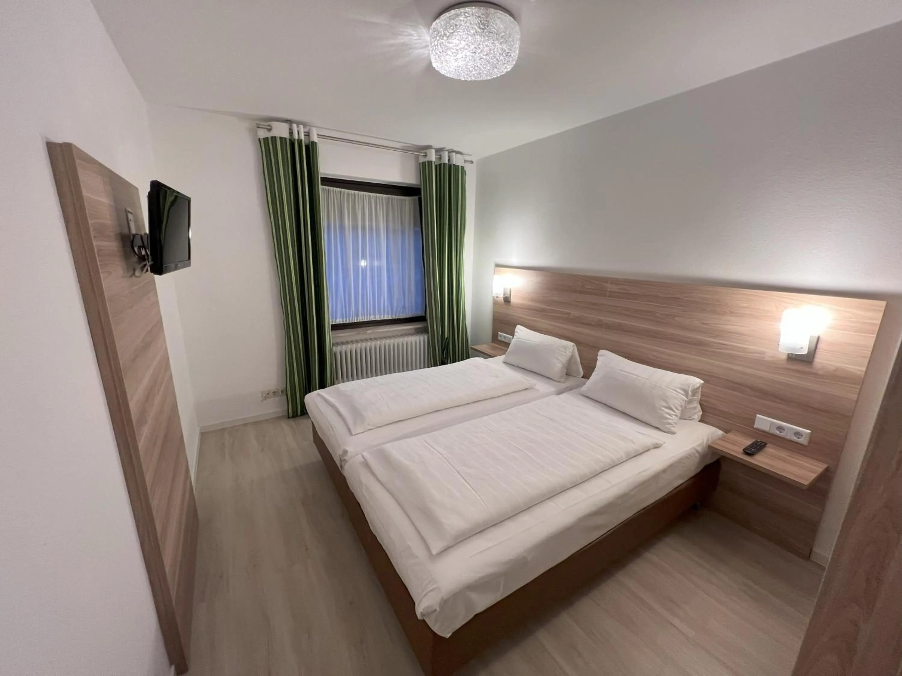 Photo of the whole room, Bed in Aparthotel Deutschmeister