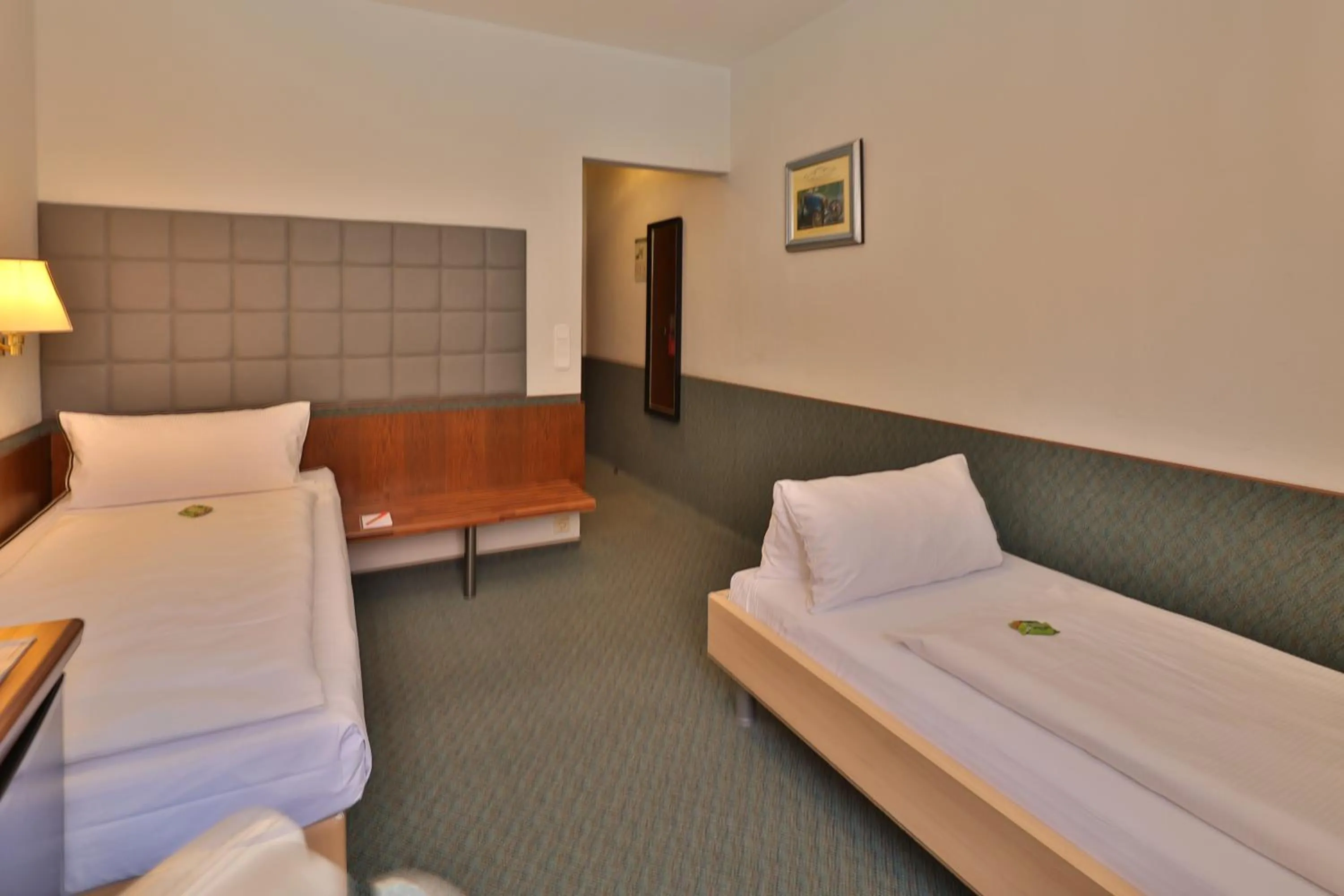 Bed in Aparthotel Deutschmeister