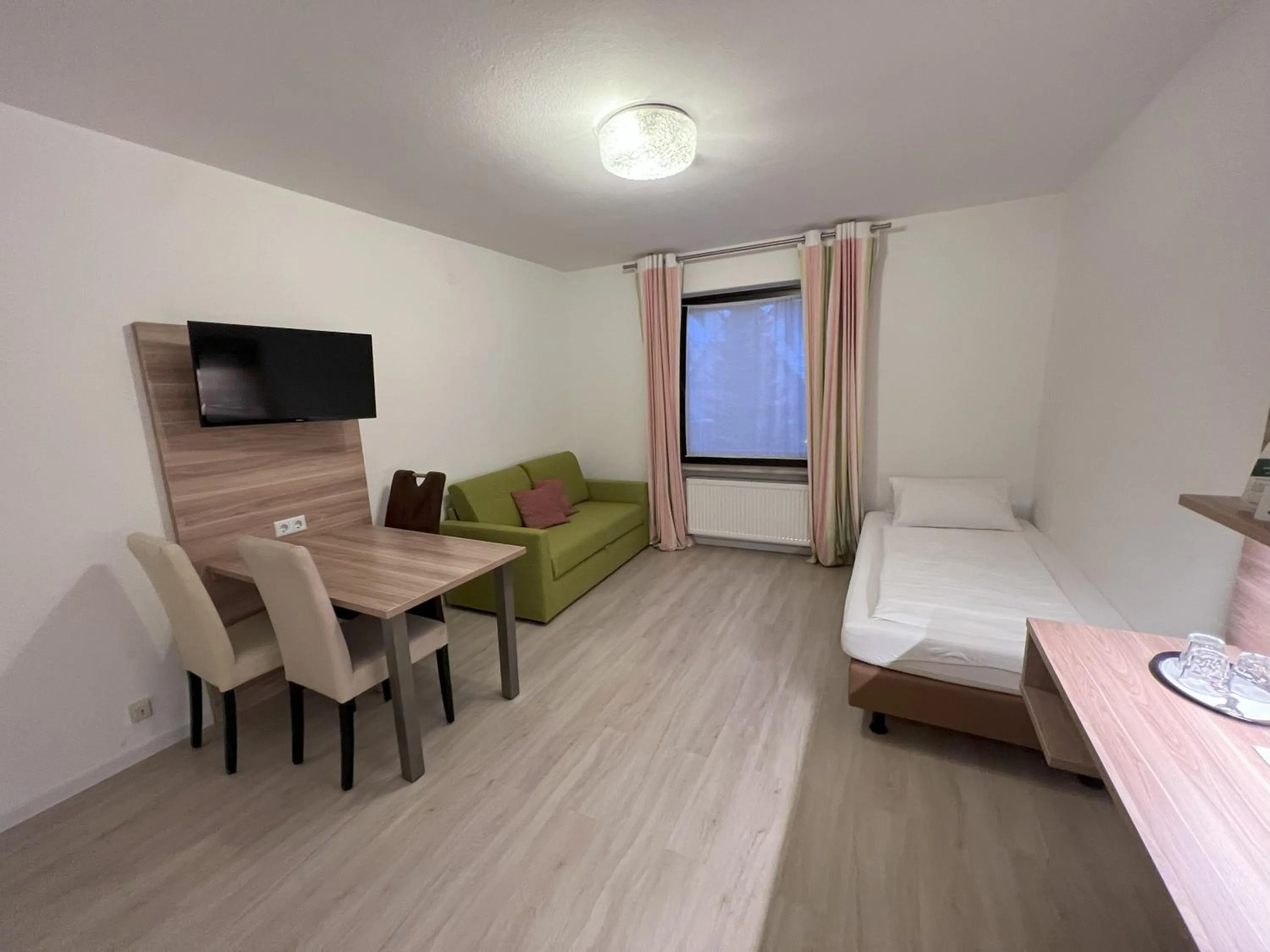 Photo of the whole room, Bed in Aparthotel Deutschmeister