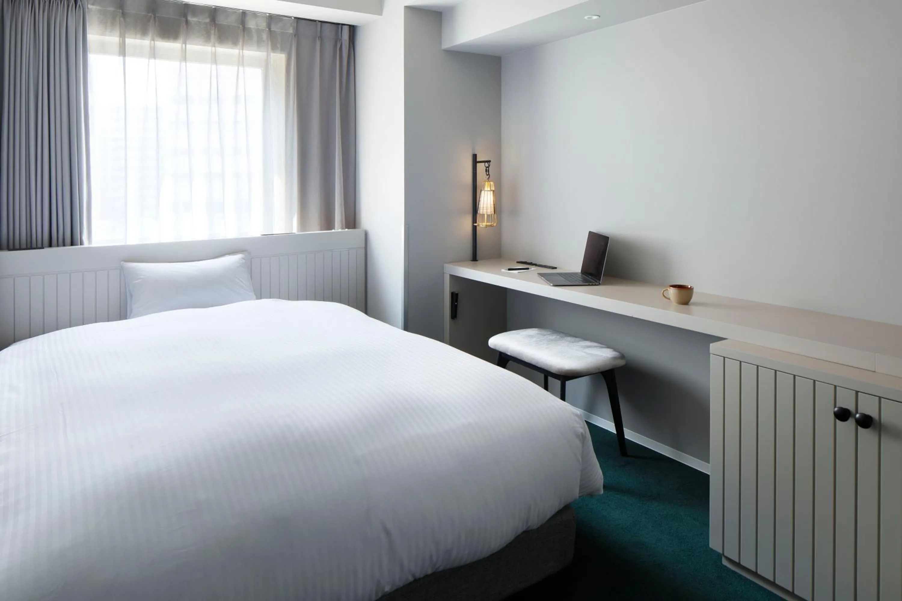 Bed in HOTEL TORIFITO KANAZAWA