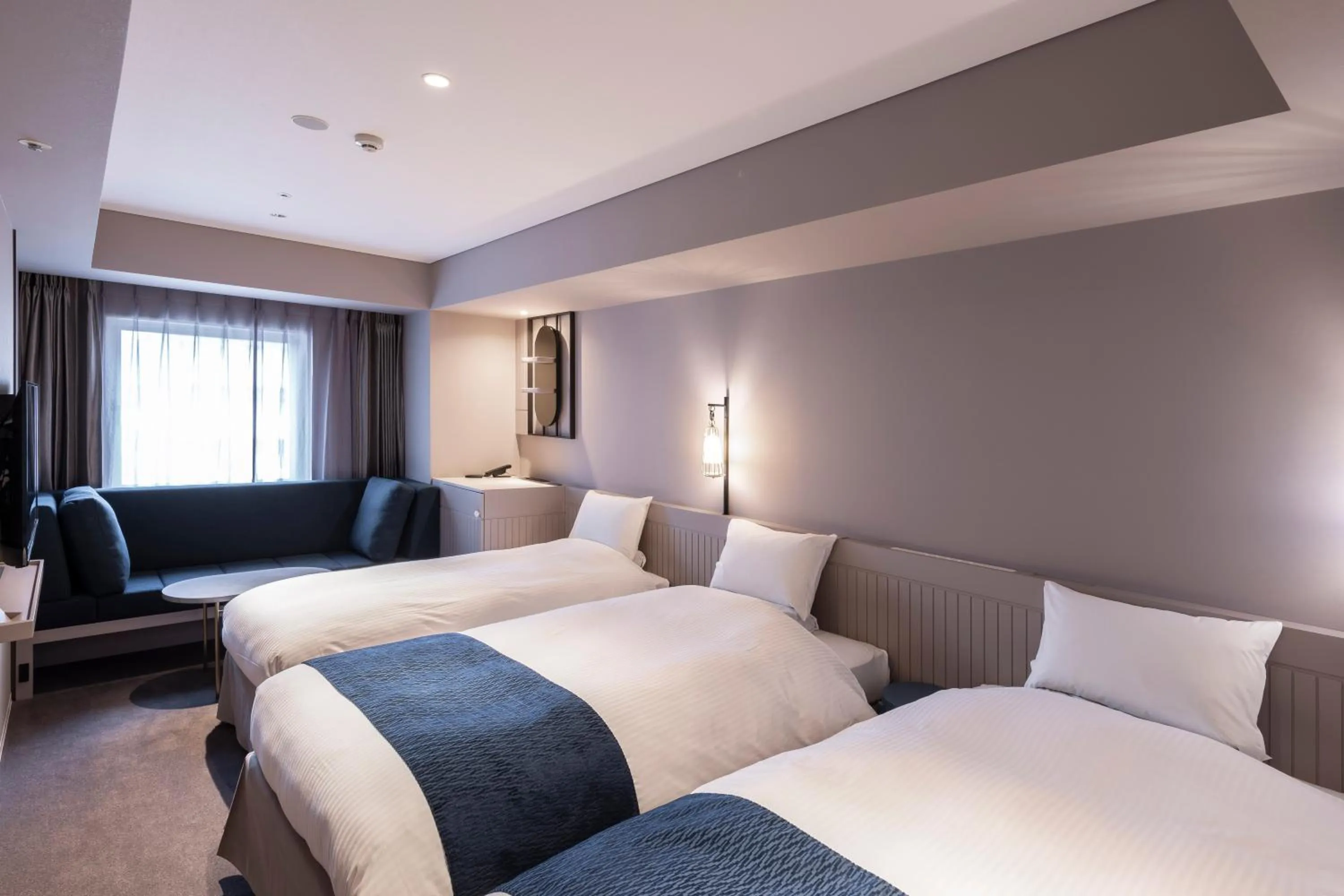 Bed in HOTEL TORIFITO KANAZAWA