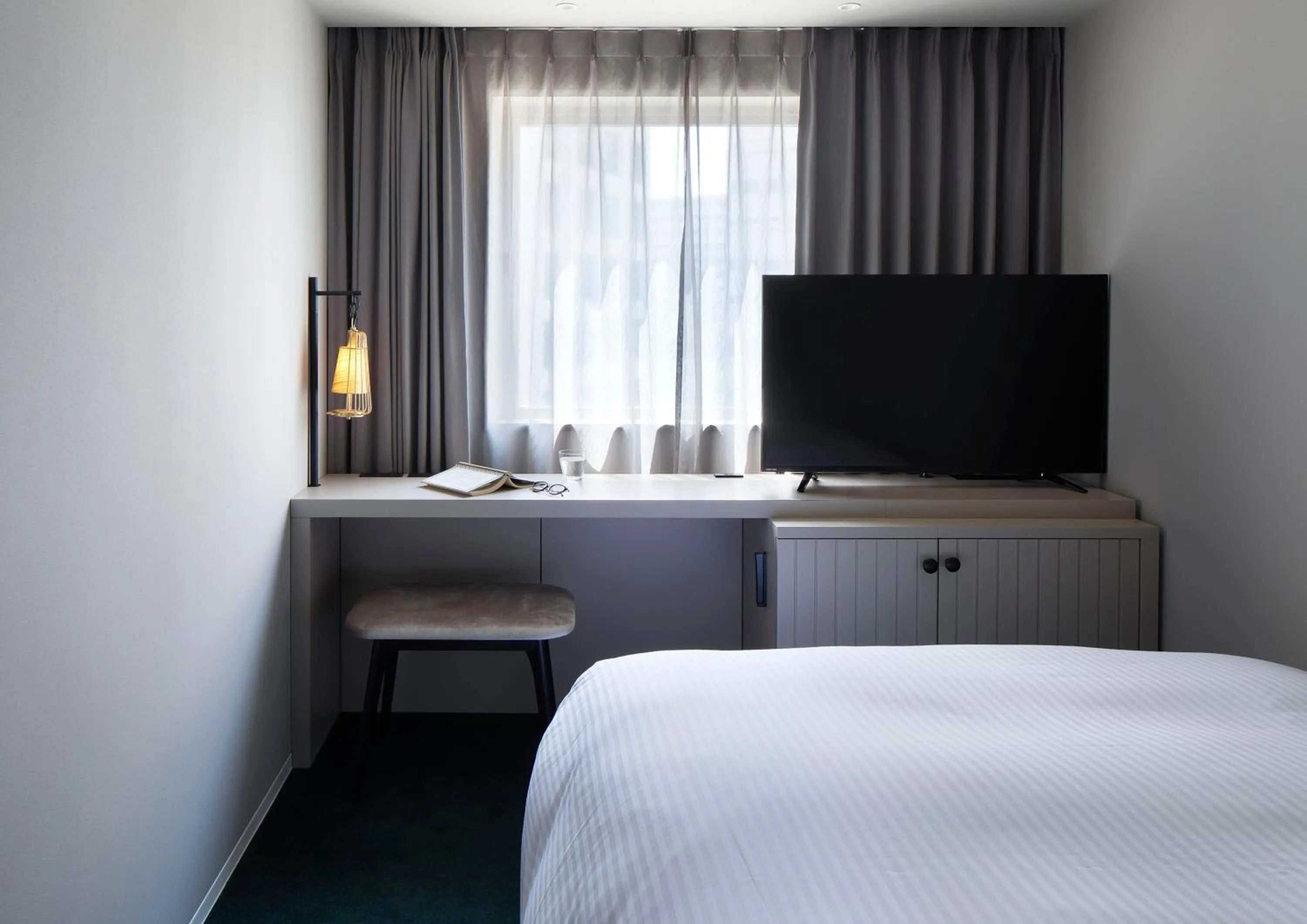 Bed in HOTEL TORIFITO KANAZAWA