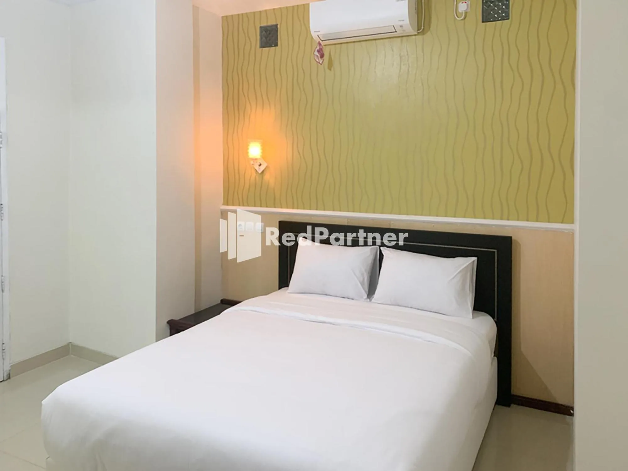 Bedroom in RedDoorz Syariah At Hotel Nuri Indah Dongkelan Yogyakarta