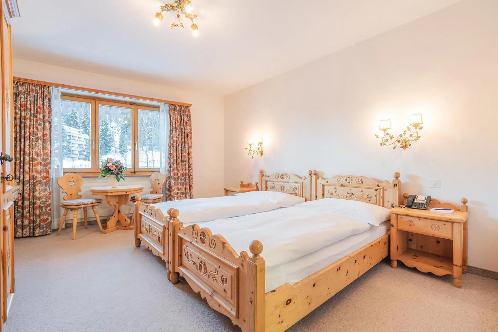 Photo of the whole room, Bed in Hotel Corvatsch - Web Check-in