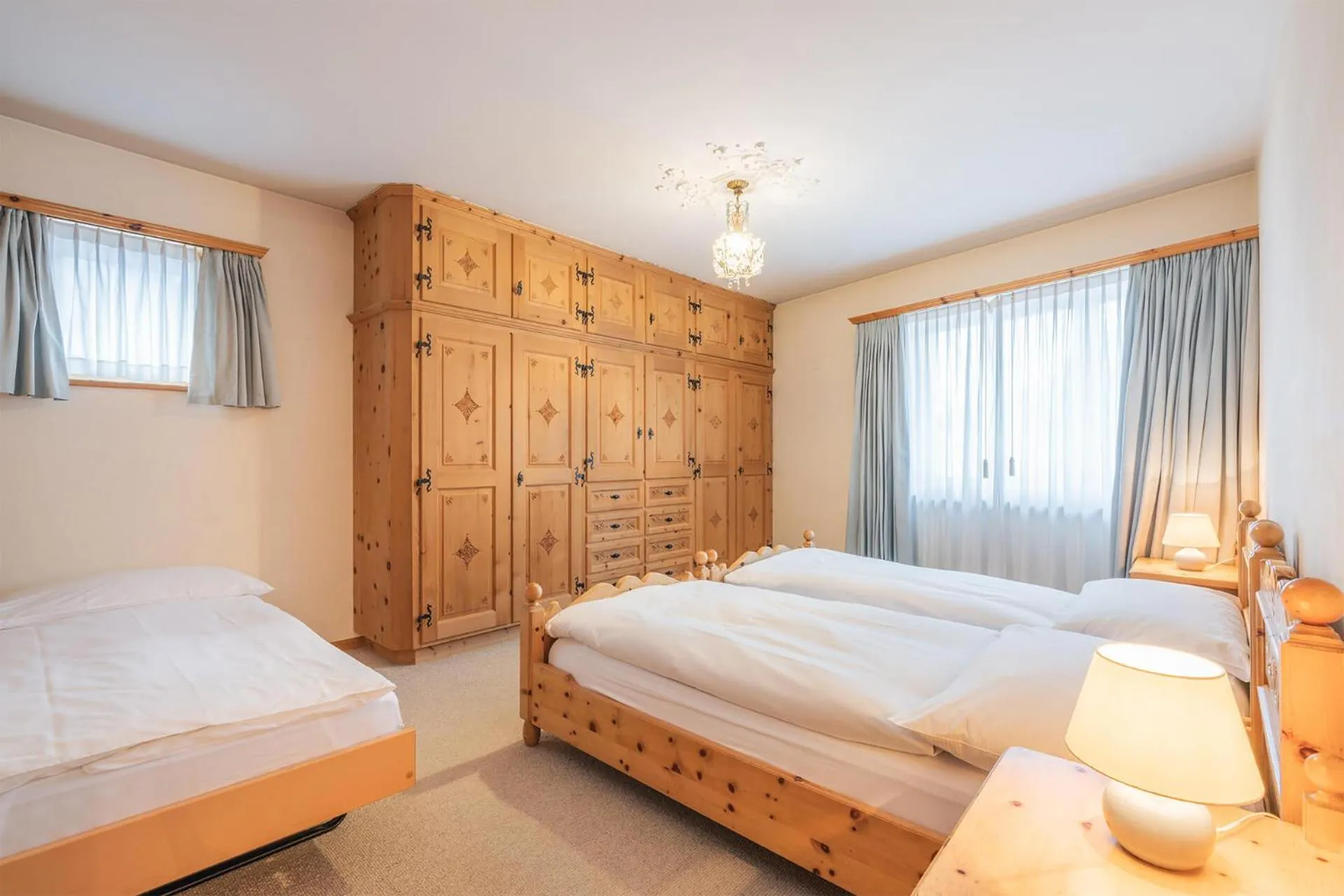 Photo of the whole room, Bed in Hotel Corvatsch - Web Check-in