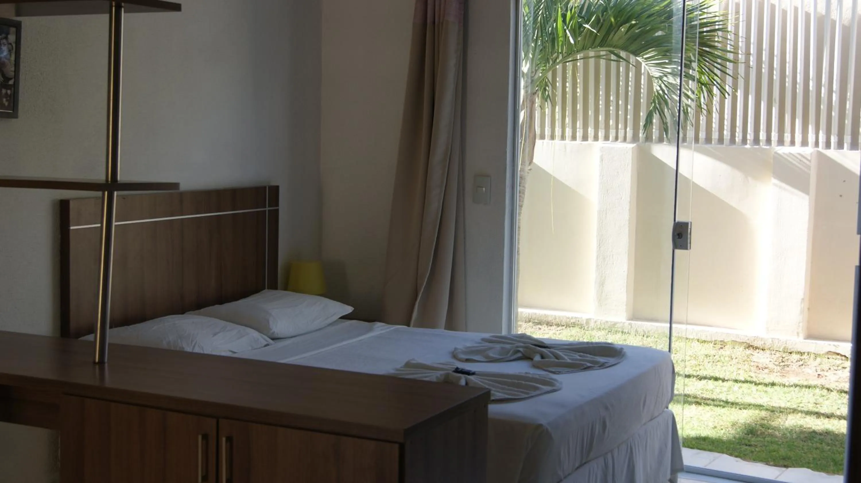 Bed in Pousada Brisa da Canoa