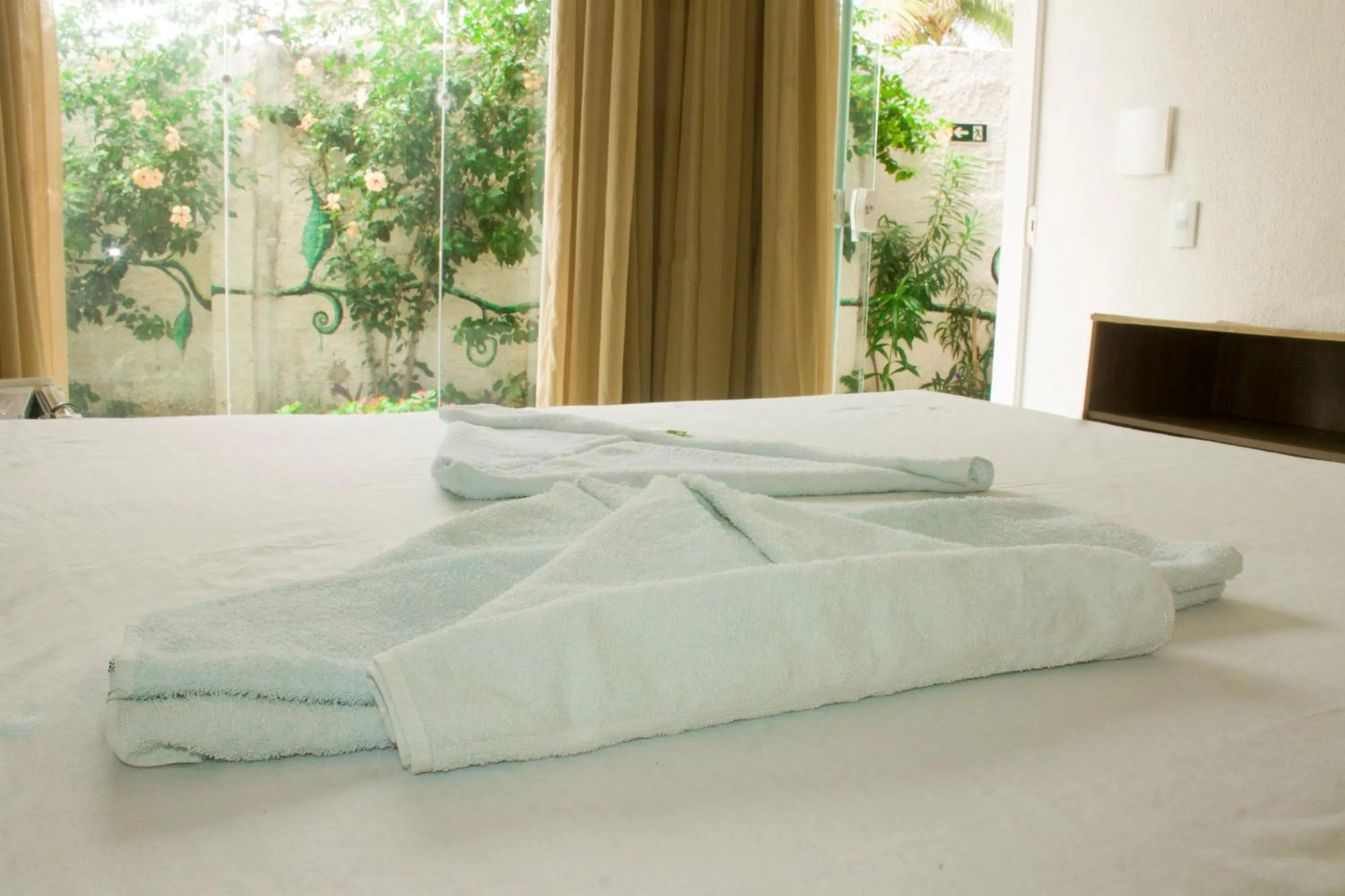 Bed in Pousada Brisa da Canoa