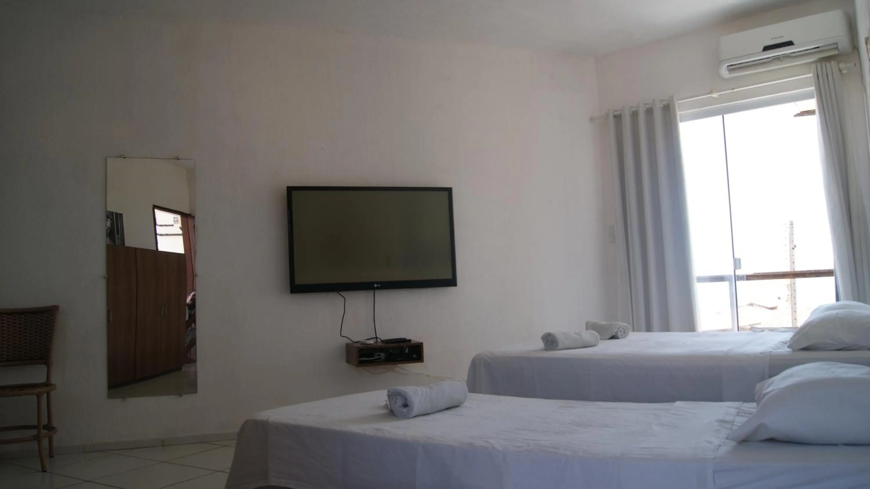 Bed in Pousada Brisa da Canoa