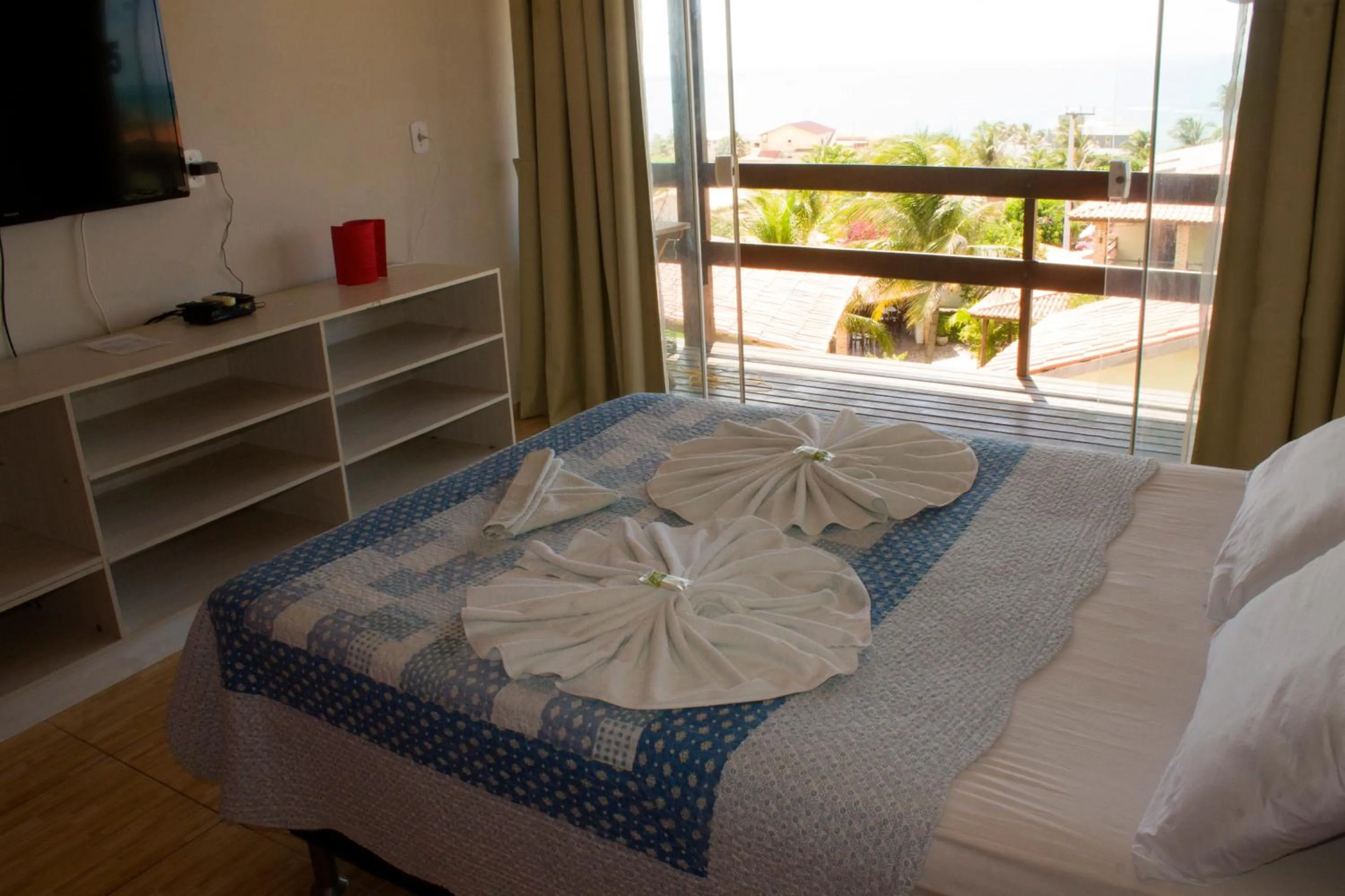 Bed in Pousada Brisa da Canoa