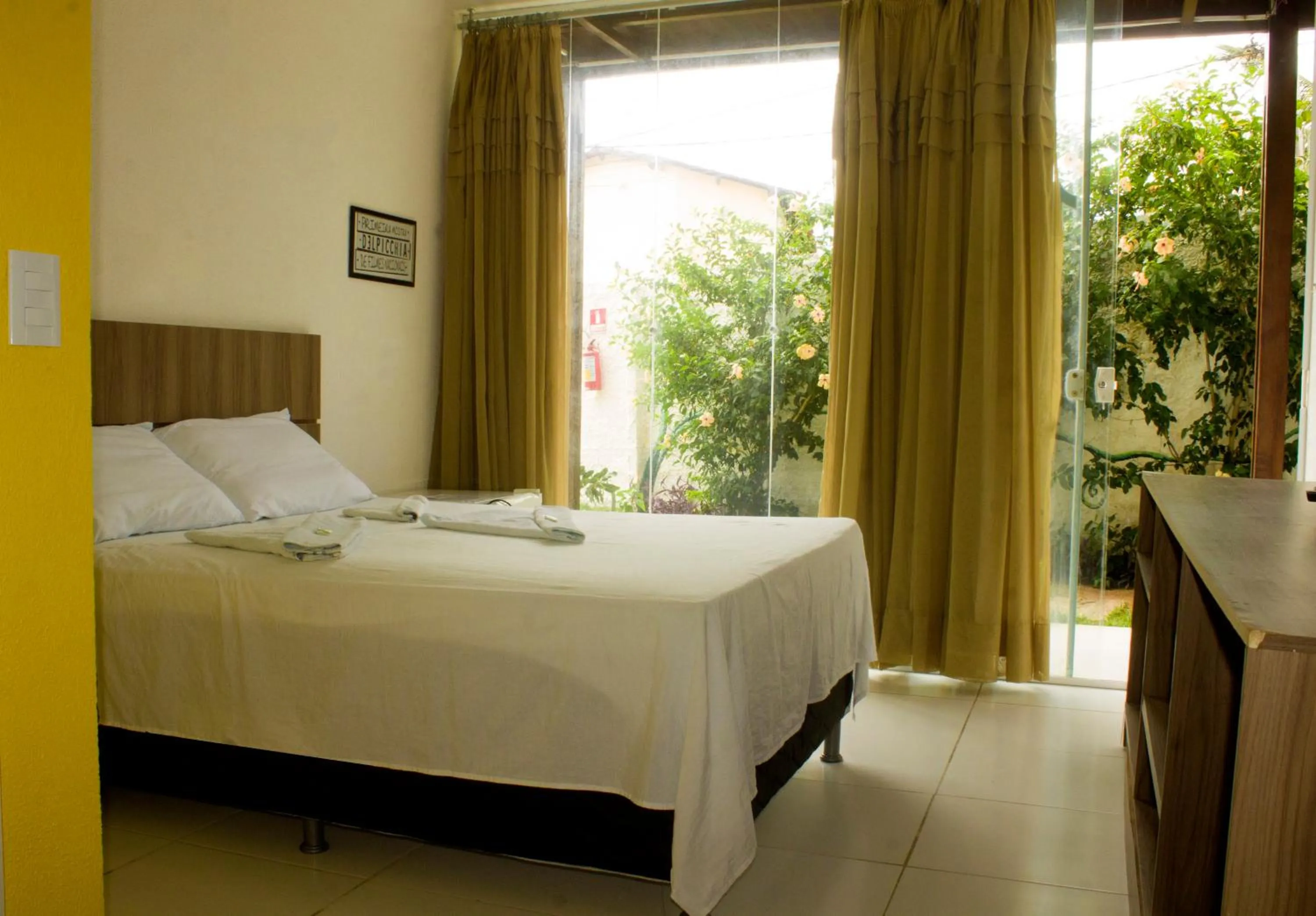 Bed in Pousada Brisa da Canoa