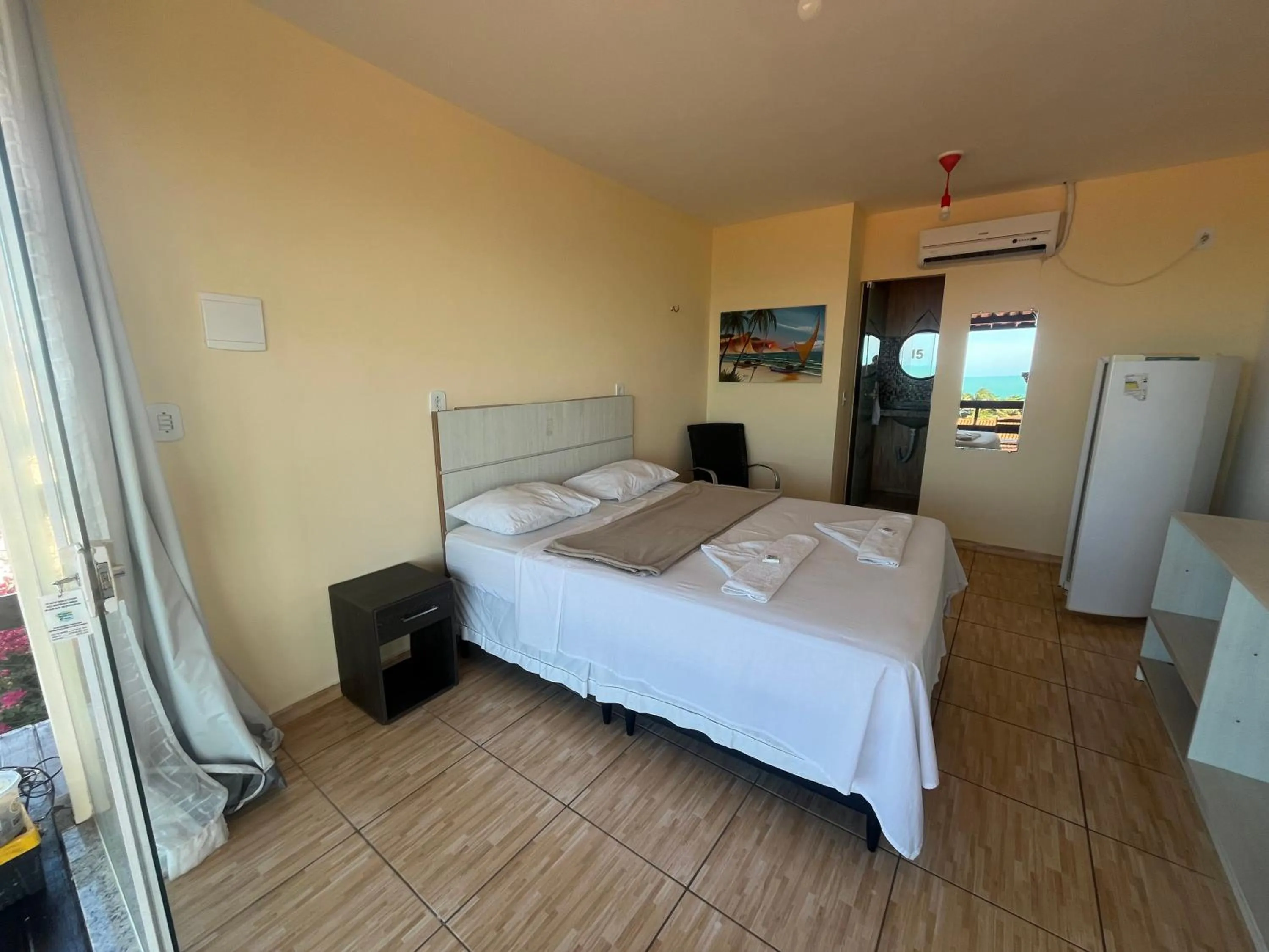 Photo of the whole room, Bed in Pousada Brisa da Canoa