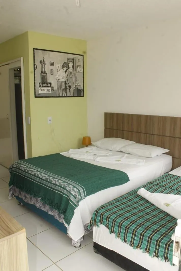 Bed in Pousada Brisa da Canoa