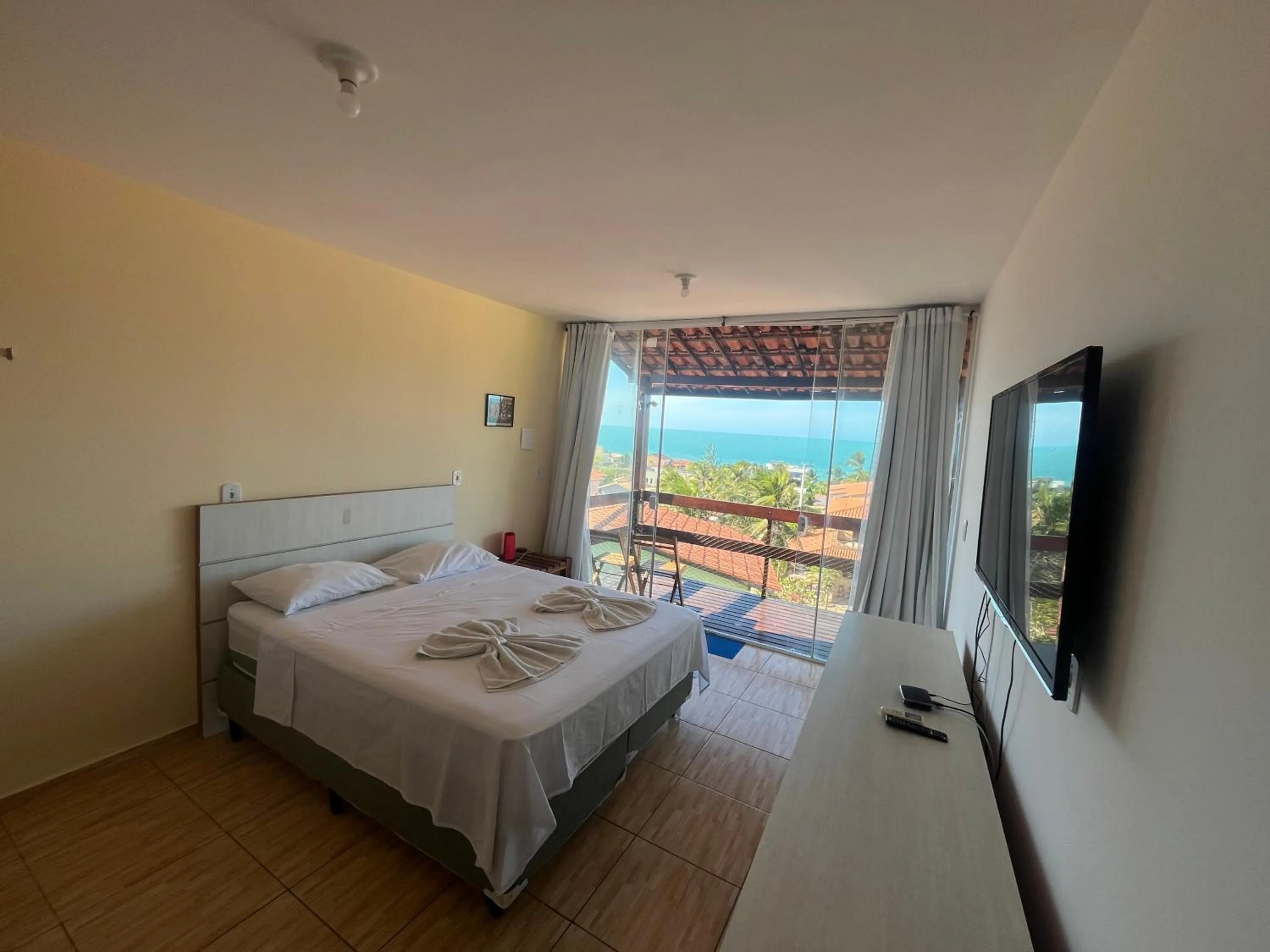 Bed in Pousada Brisa da Canoa