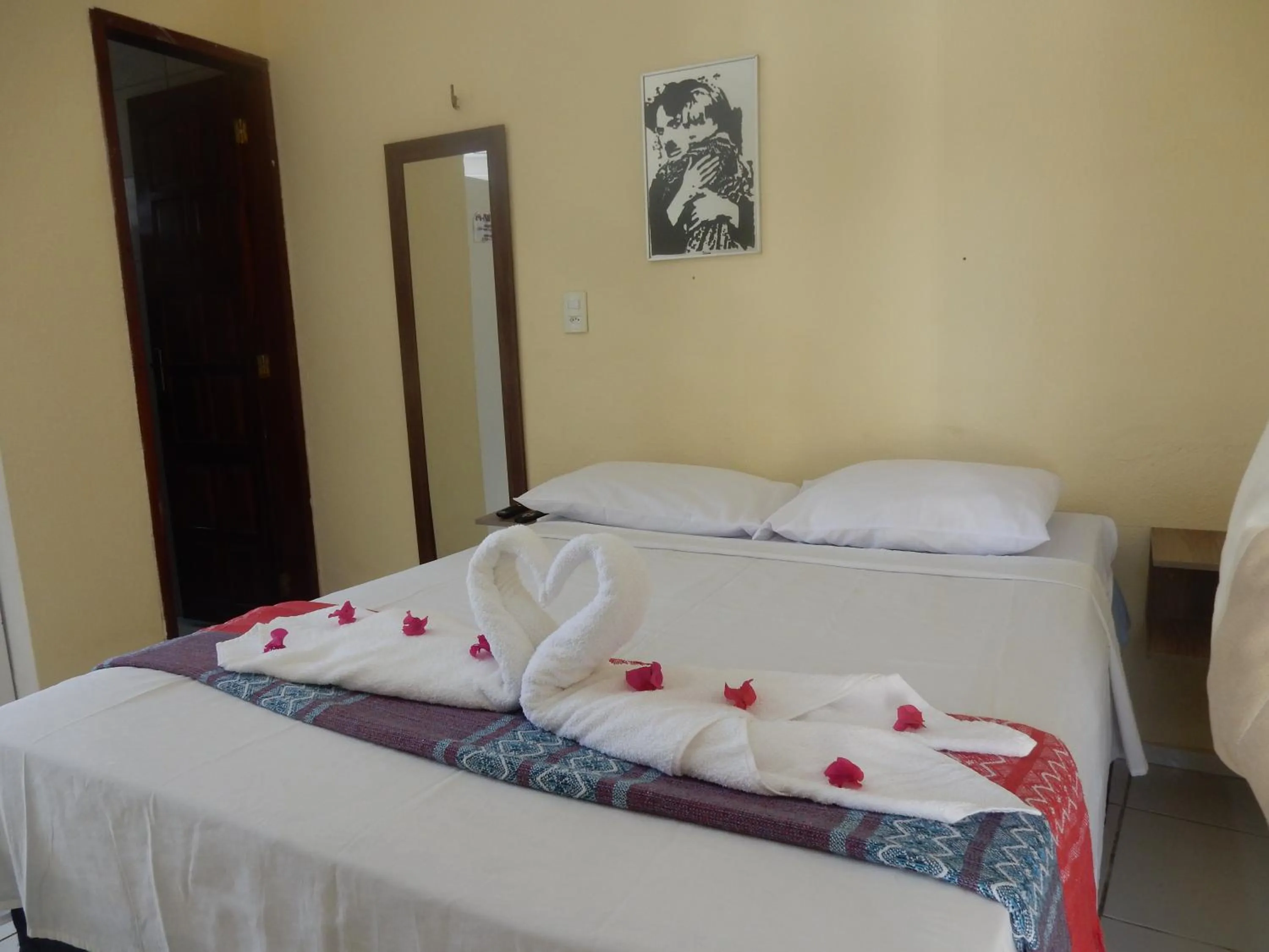 Bed in Pousada Brisa da Canoa