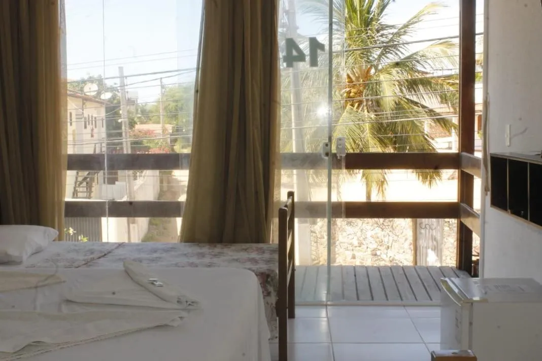 Bed in Pousada Brisa da Canoa