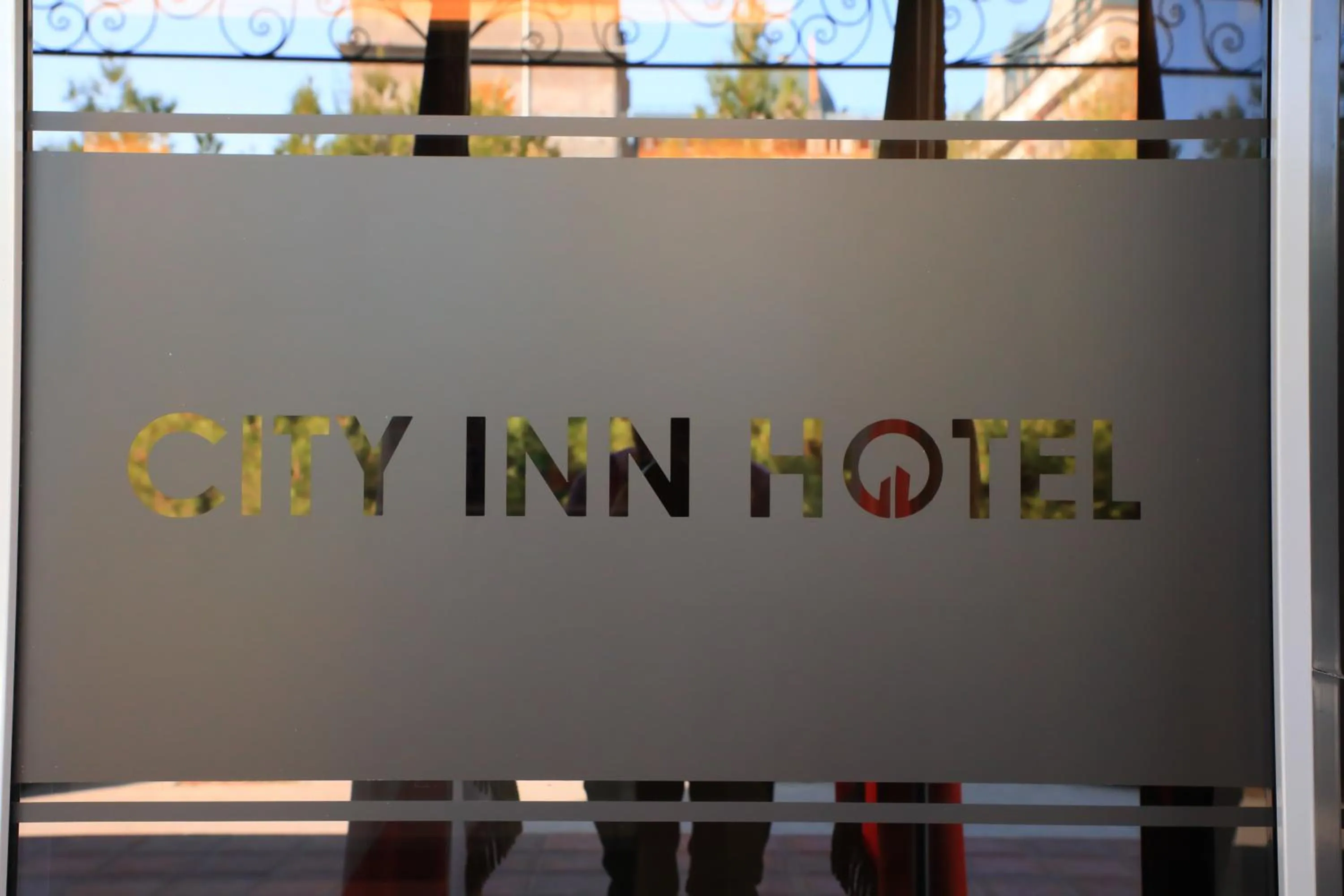Property logo or sign in City INN Hotel